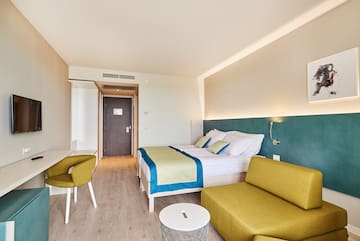 a room with a bed and a couch