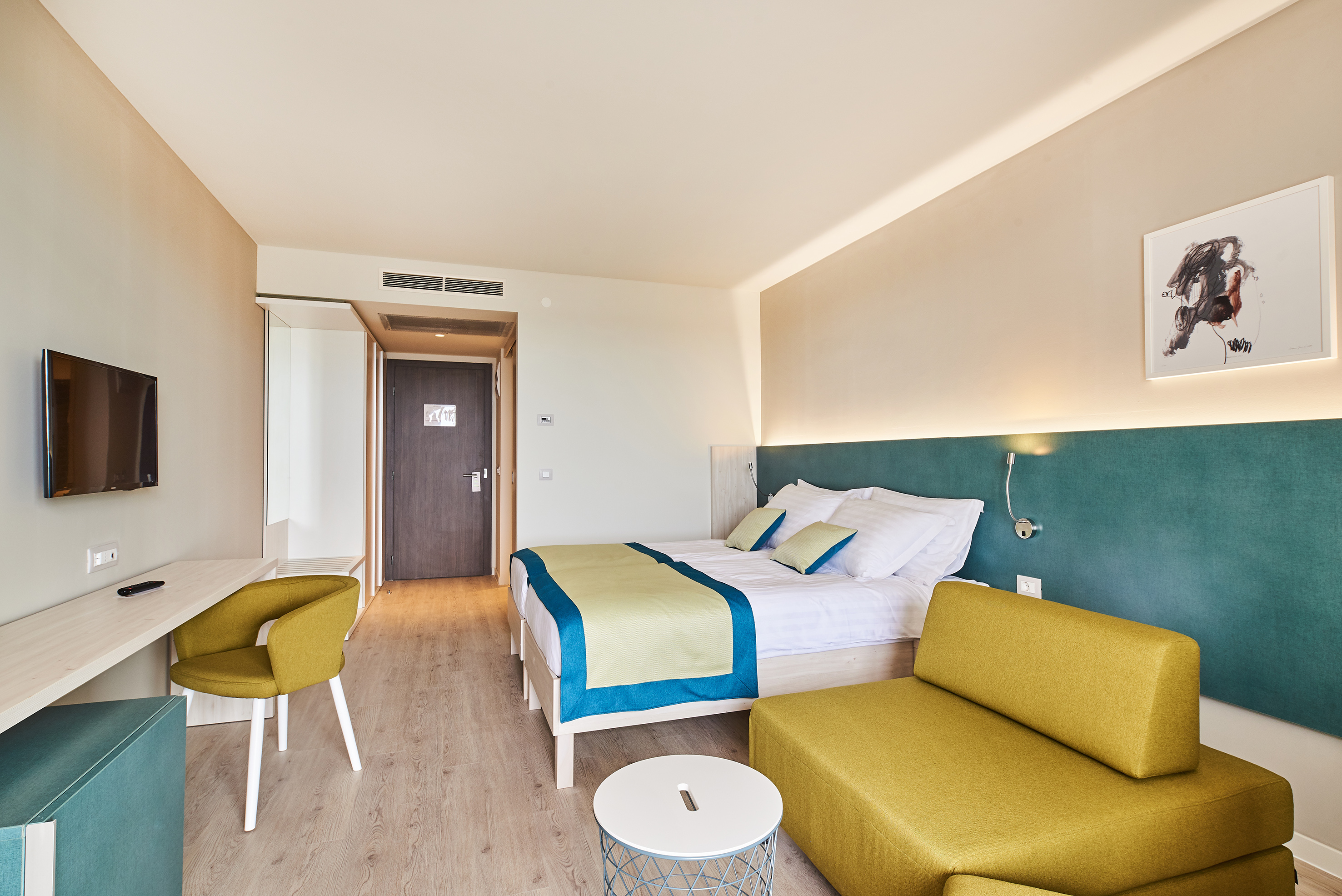 a room with a bed and a couch