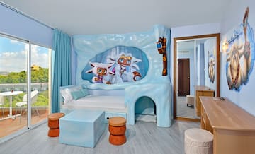 a room with a bed and a mirror