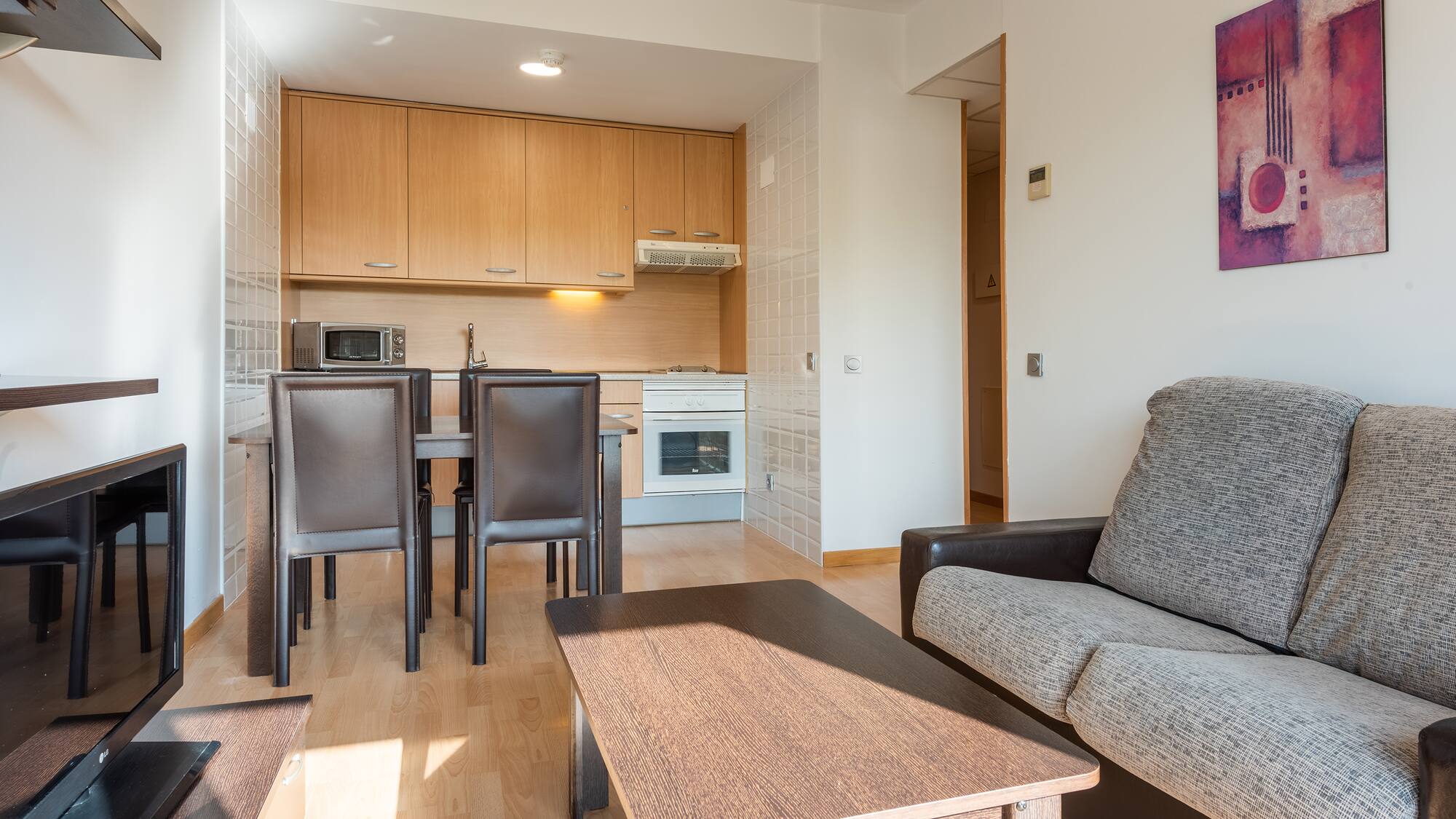 a living room with a couch and table