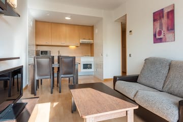 a living room with a couch and table