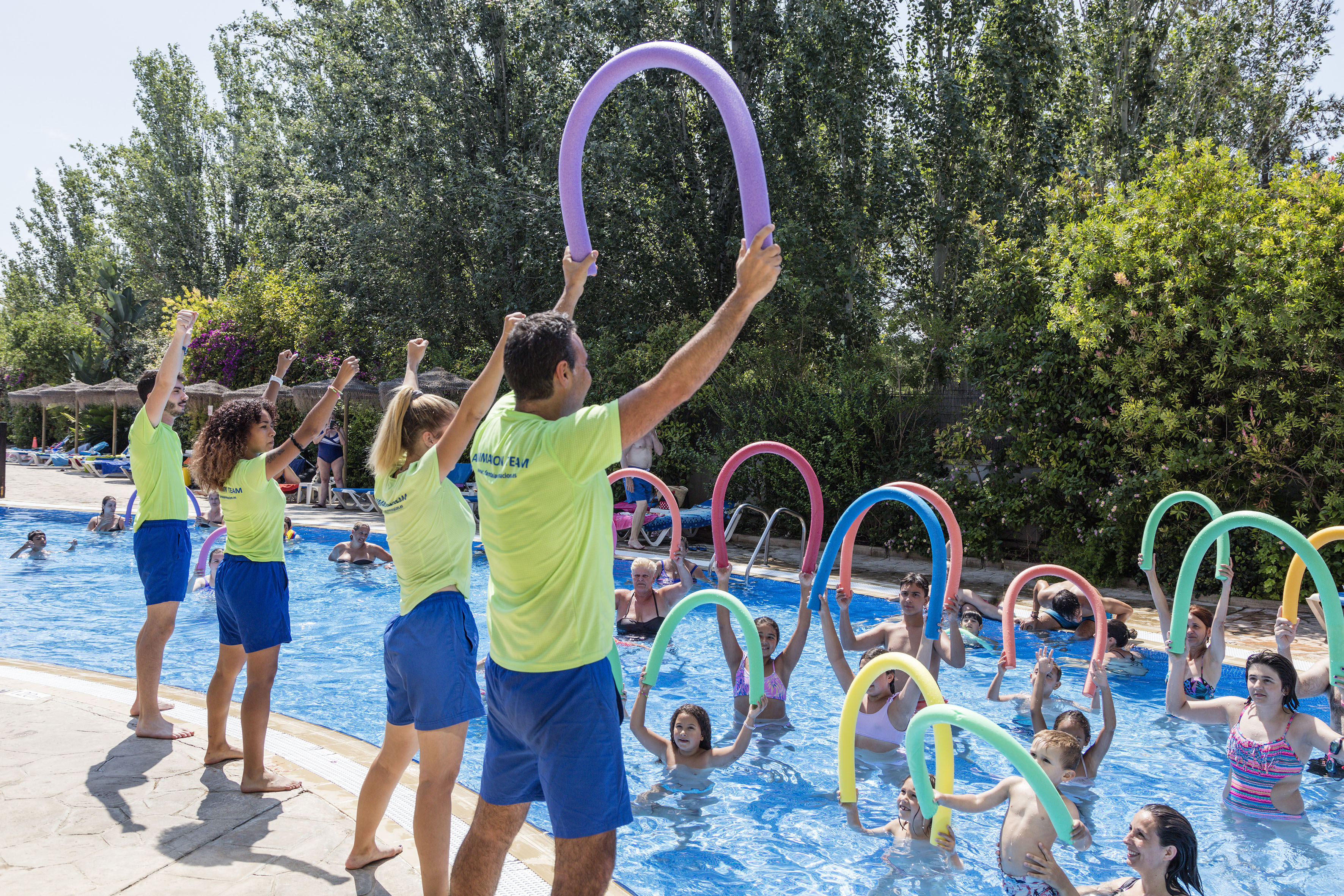 a group of people in a pool