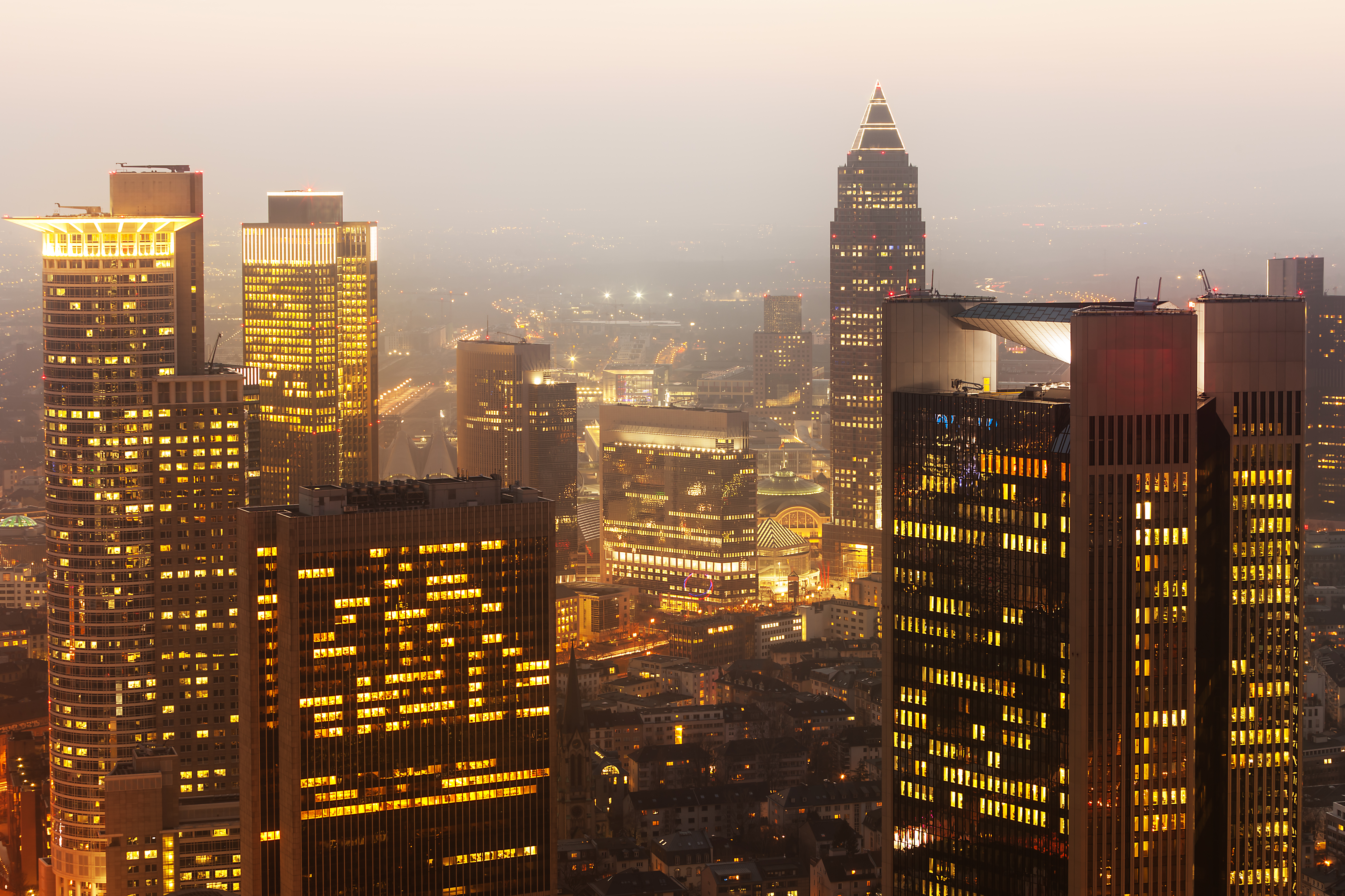 a city skyline with many tall buildings