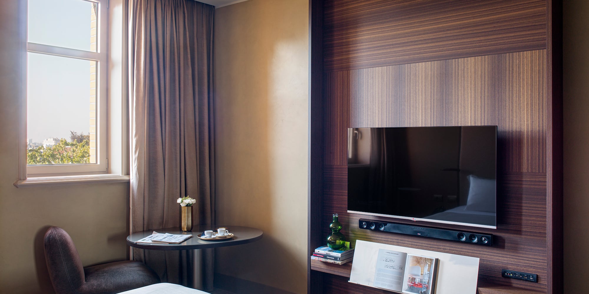 a room with a tv and a table