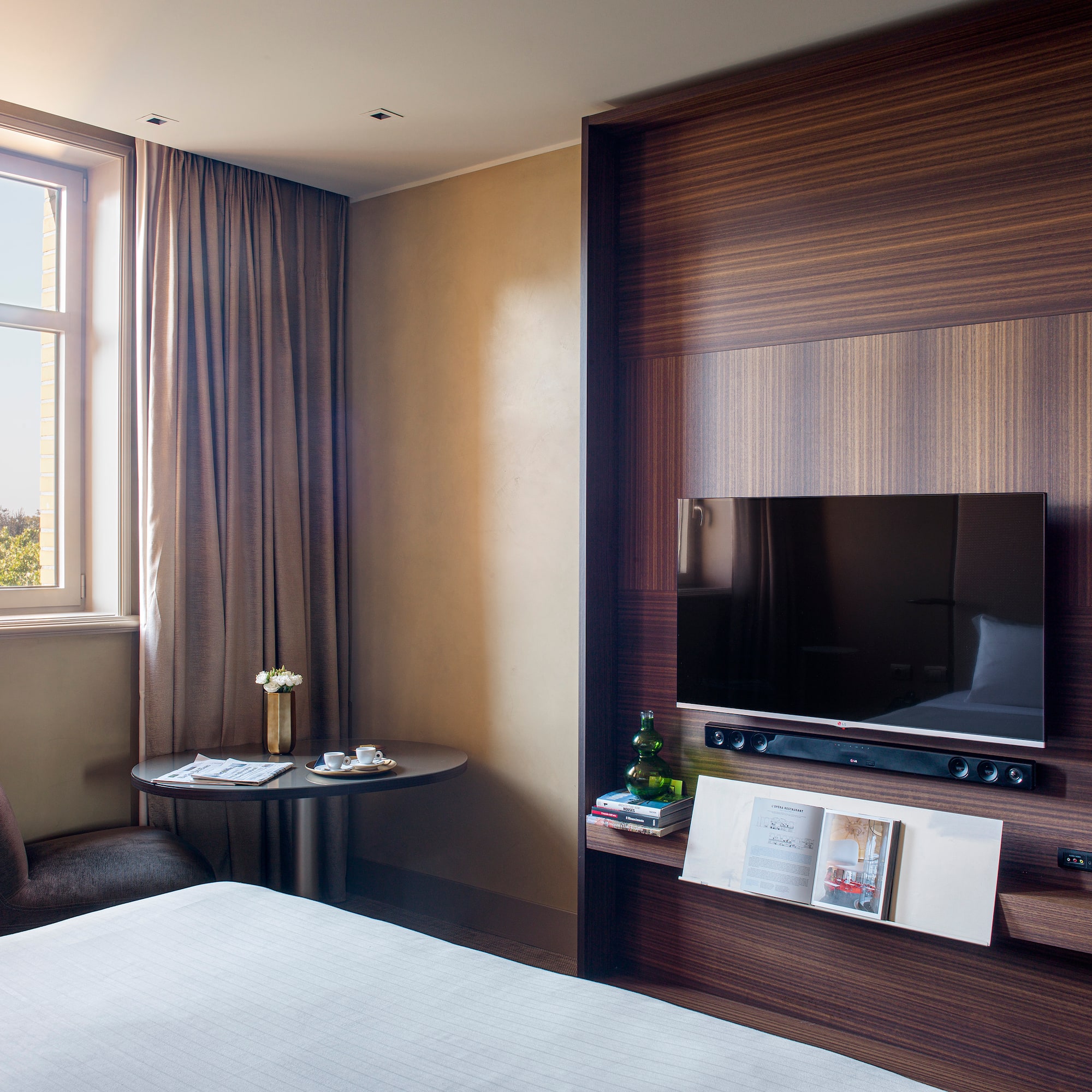 a room with a tv and a table