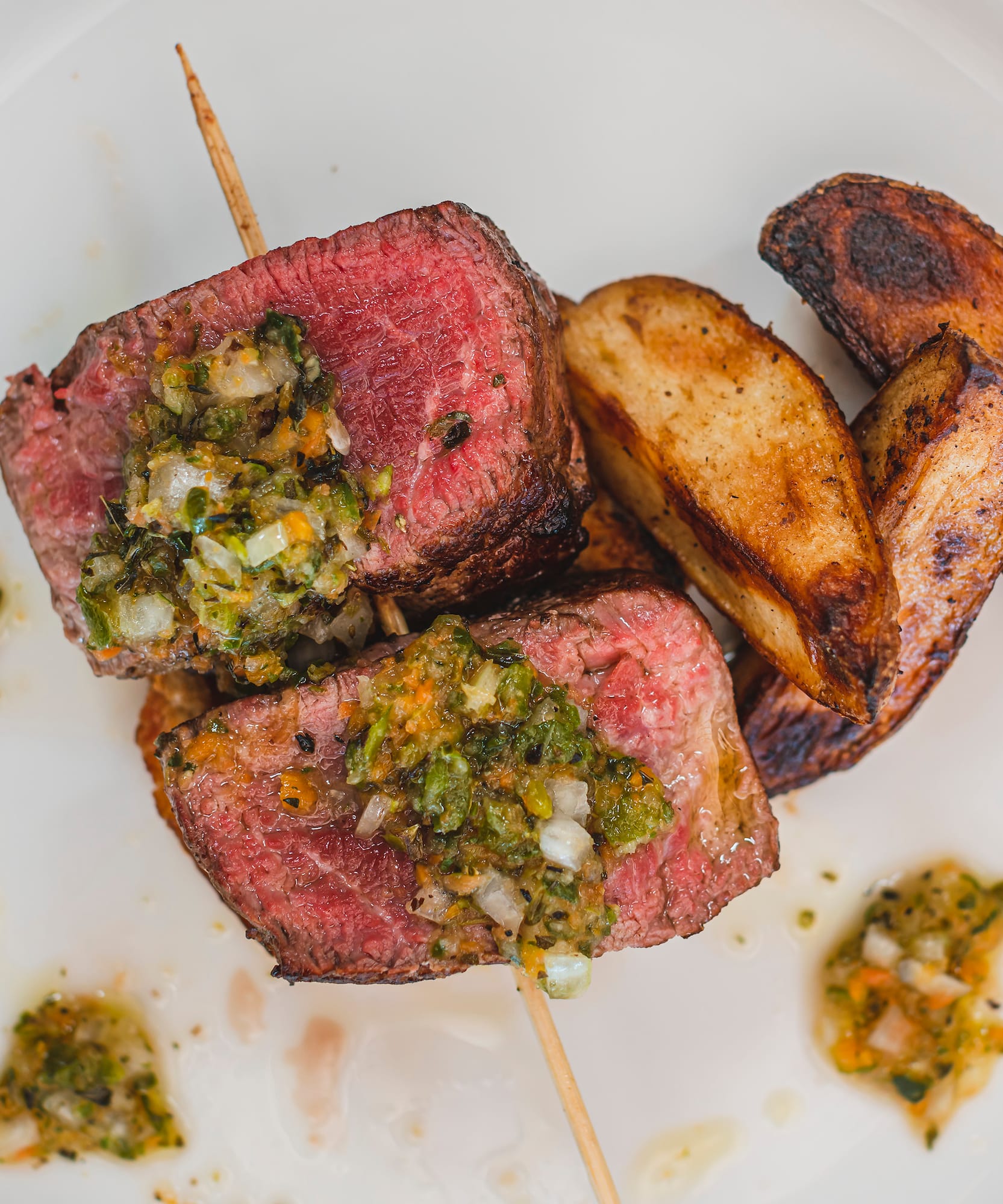 a plate of food on a white surface