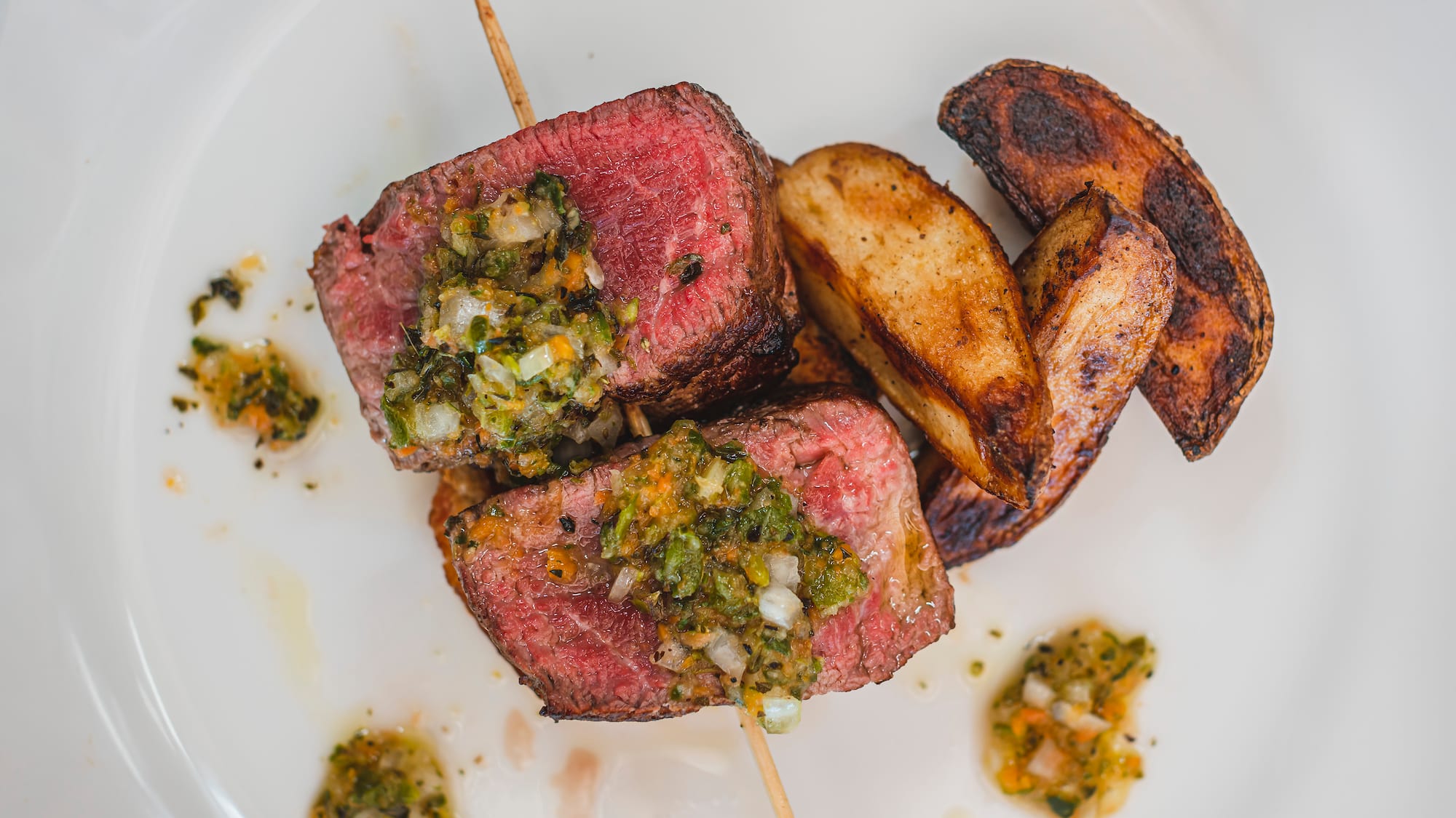 a plate of food on a white surface
