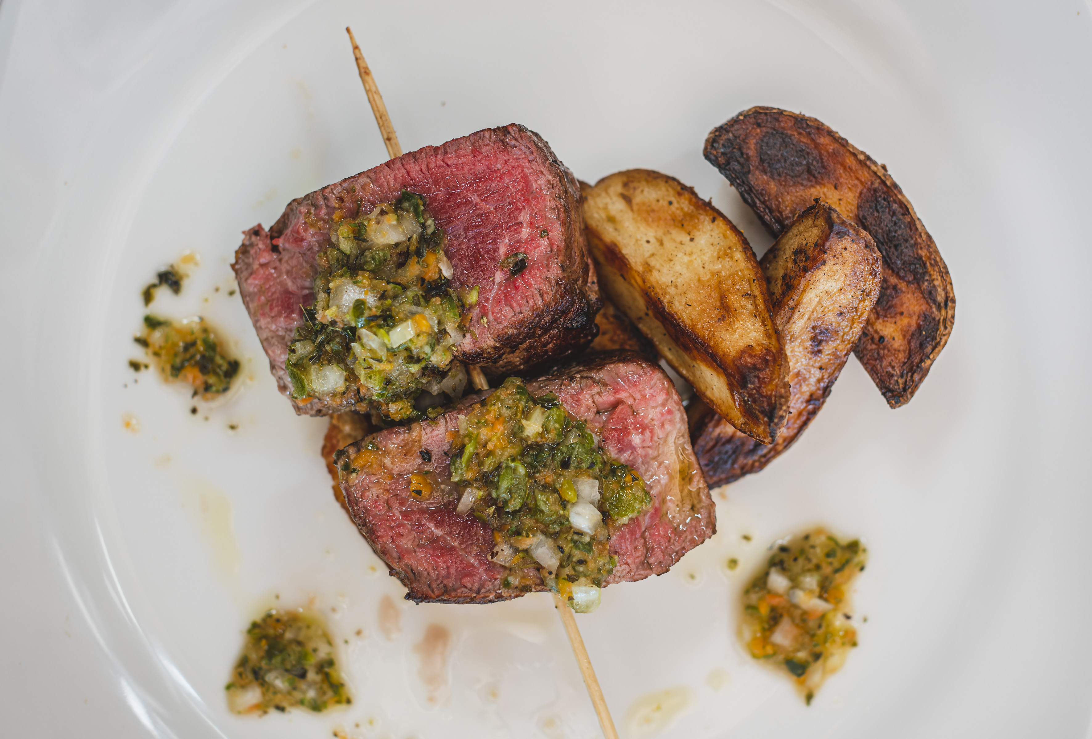 a plate of food on a white surface