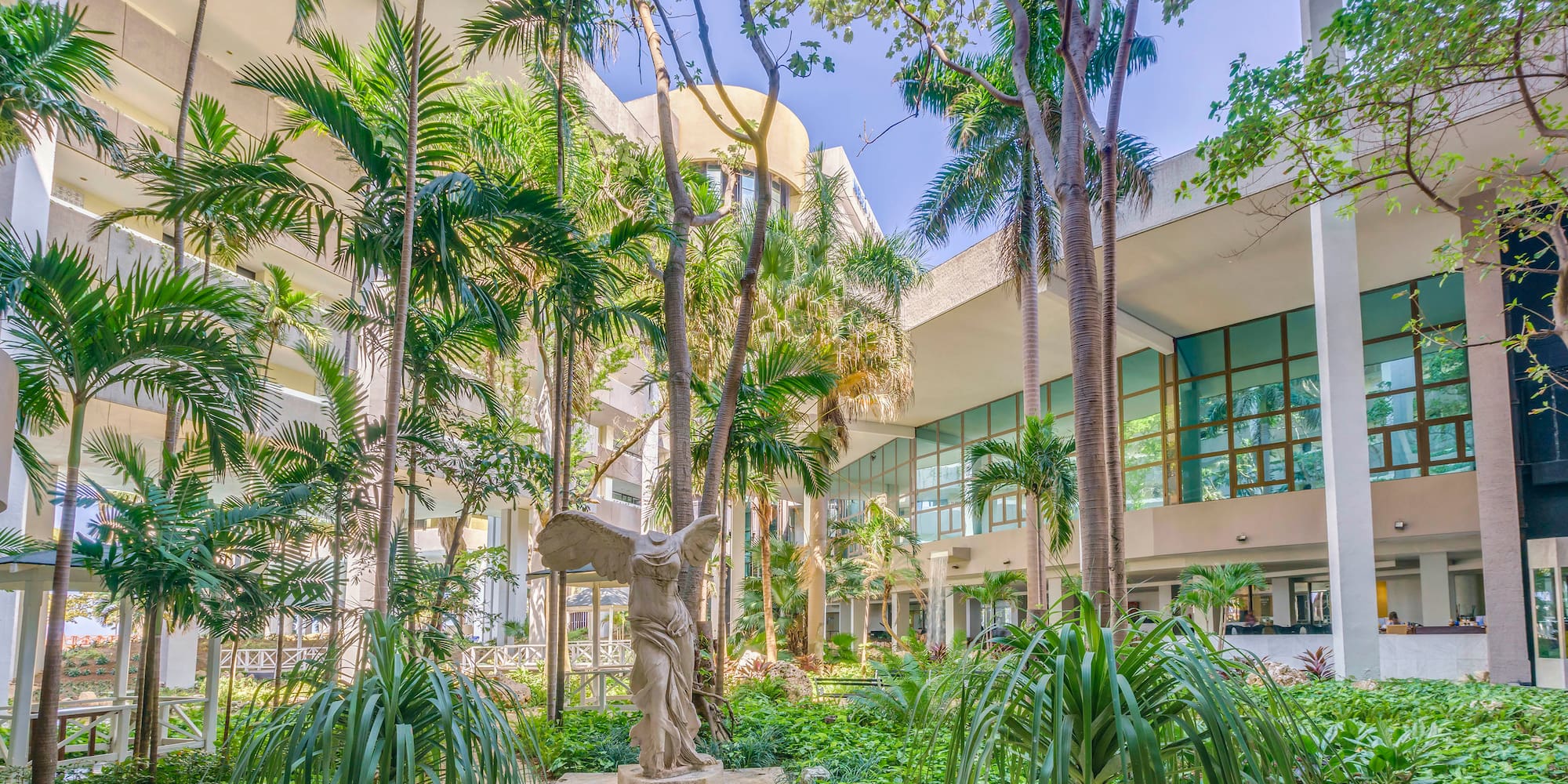 a statue in a courtyard of a building