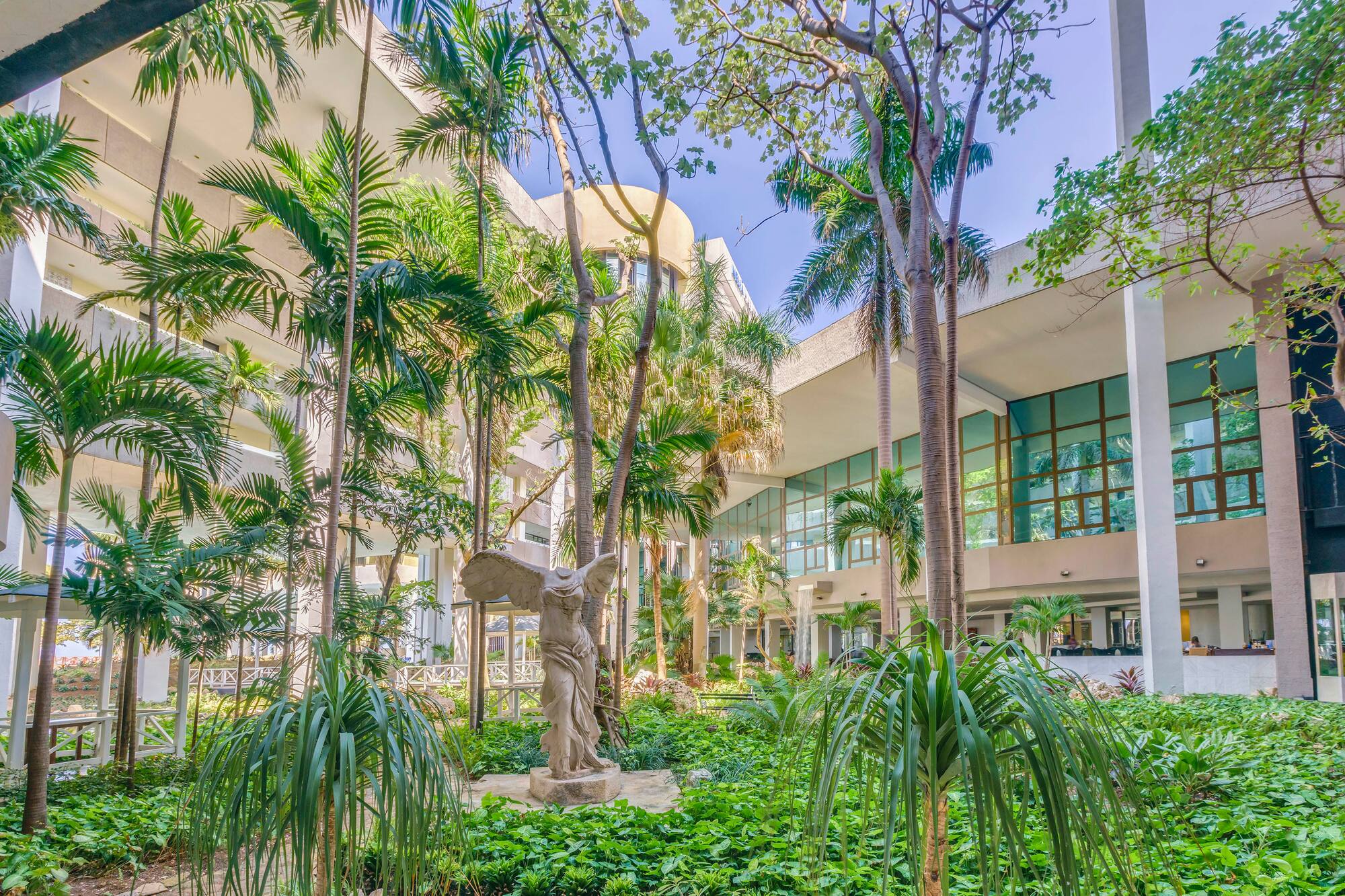 a statue in a courtyard of a building