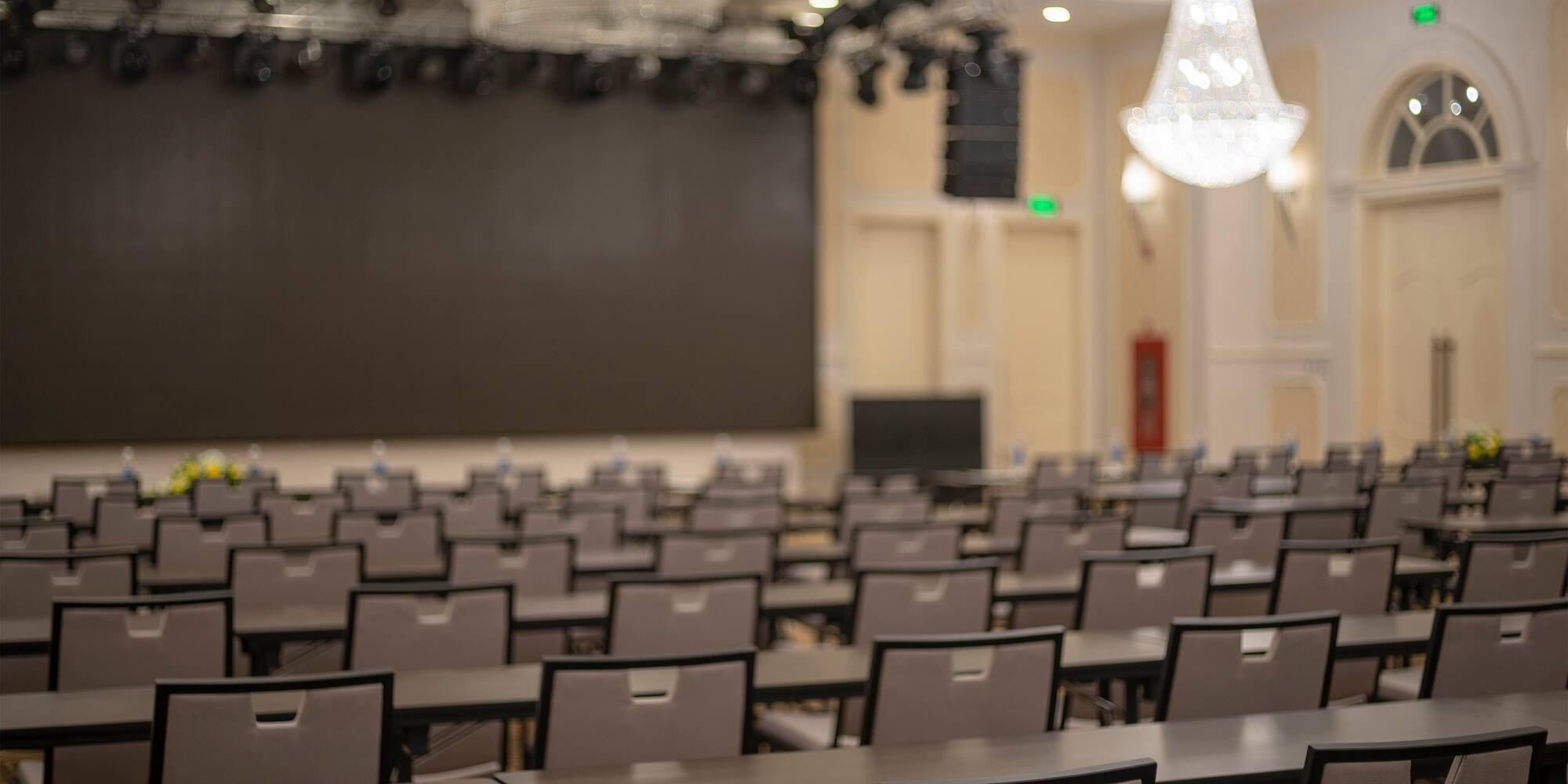 a room with chairs and a stage