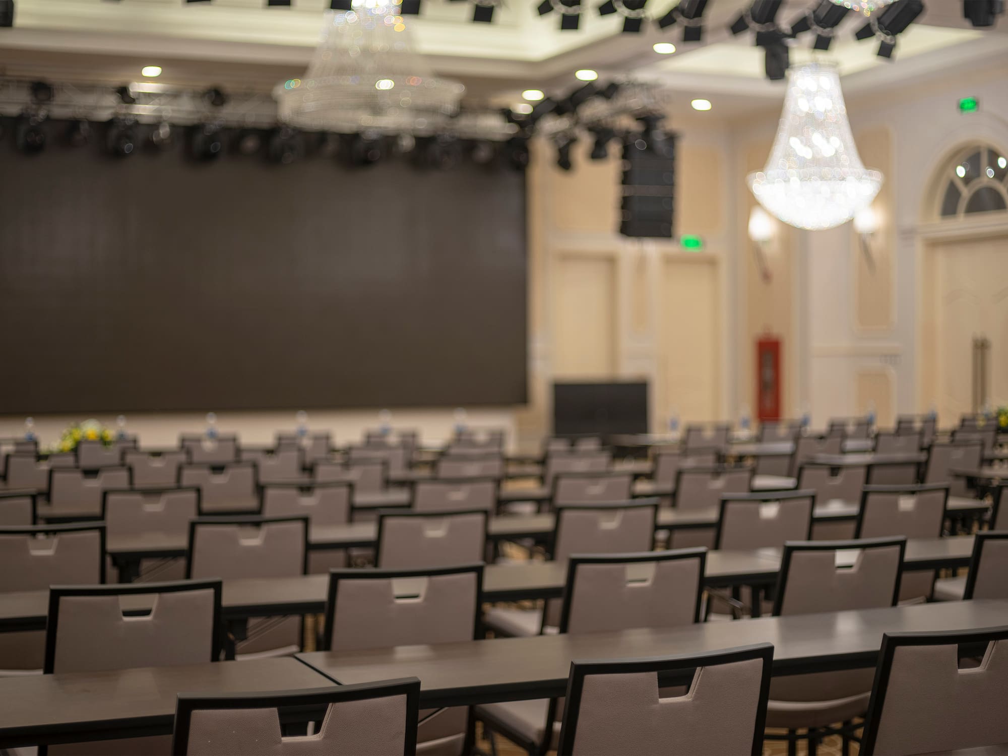 a room with chairs and a stage