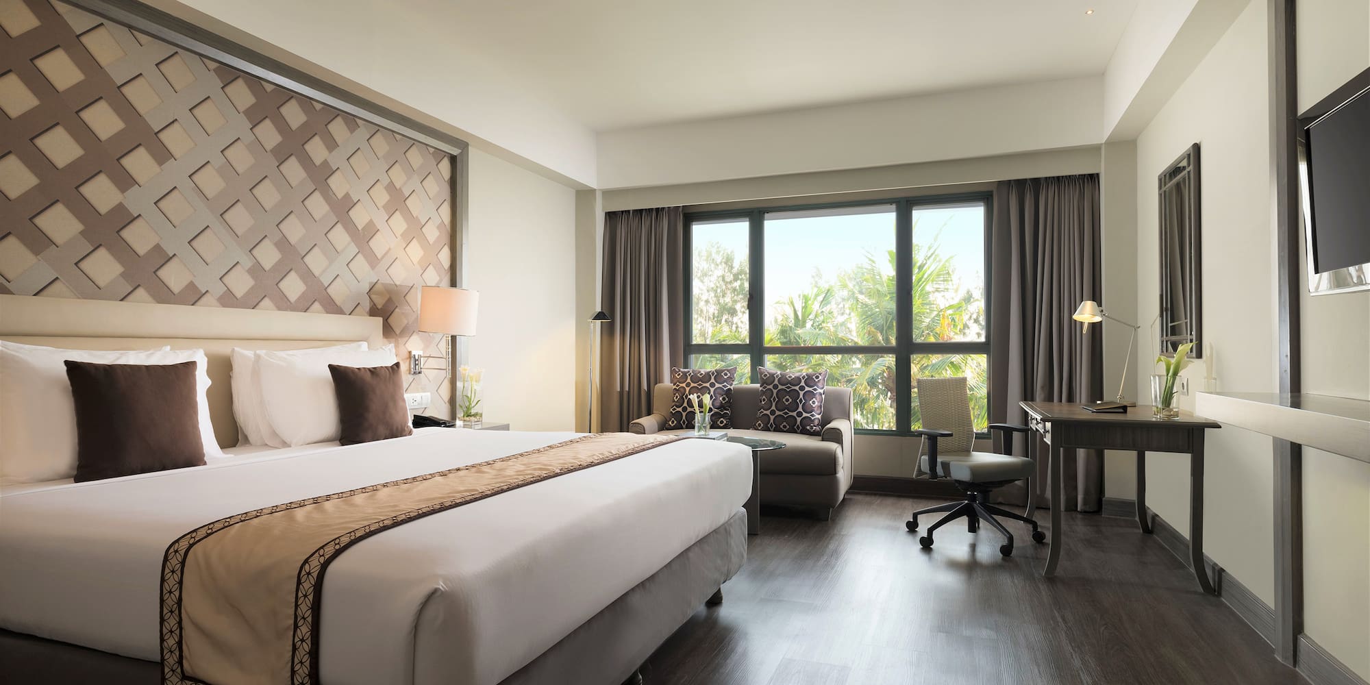 a room with a bed and a desk