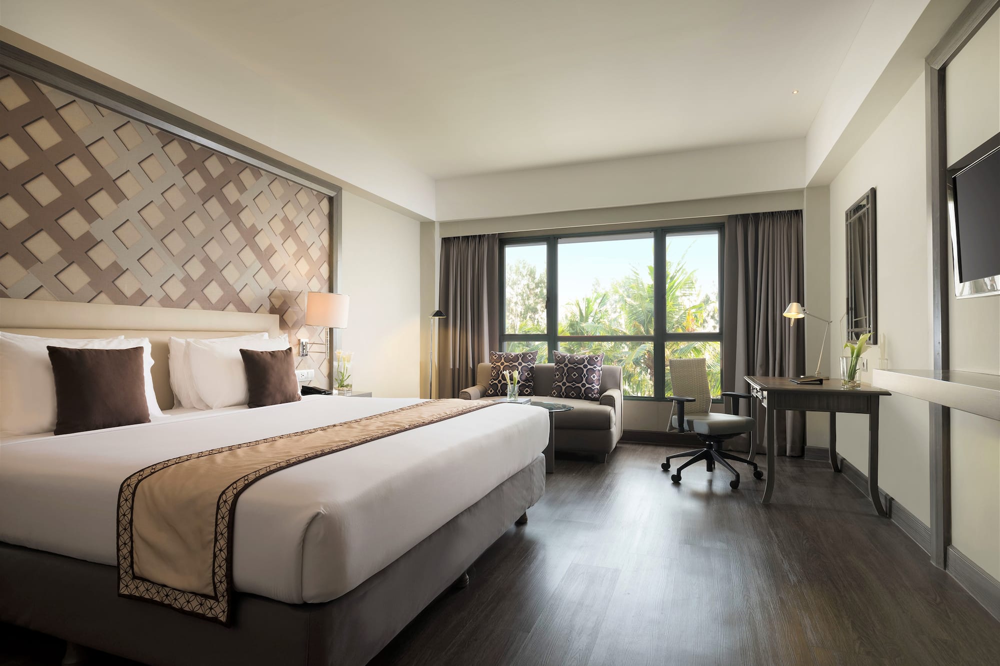 a room with a bed and a desk