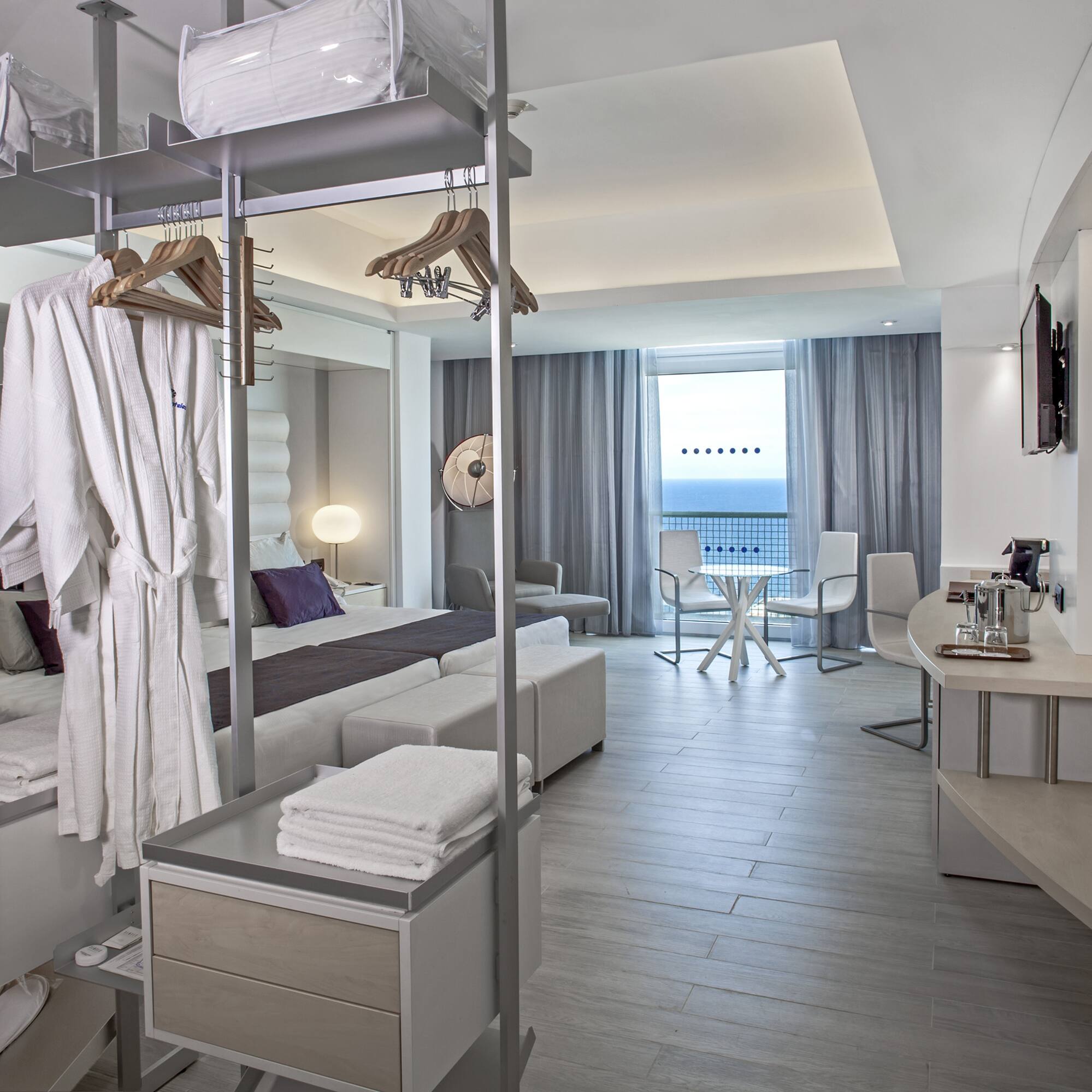 a room with a bed and a table