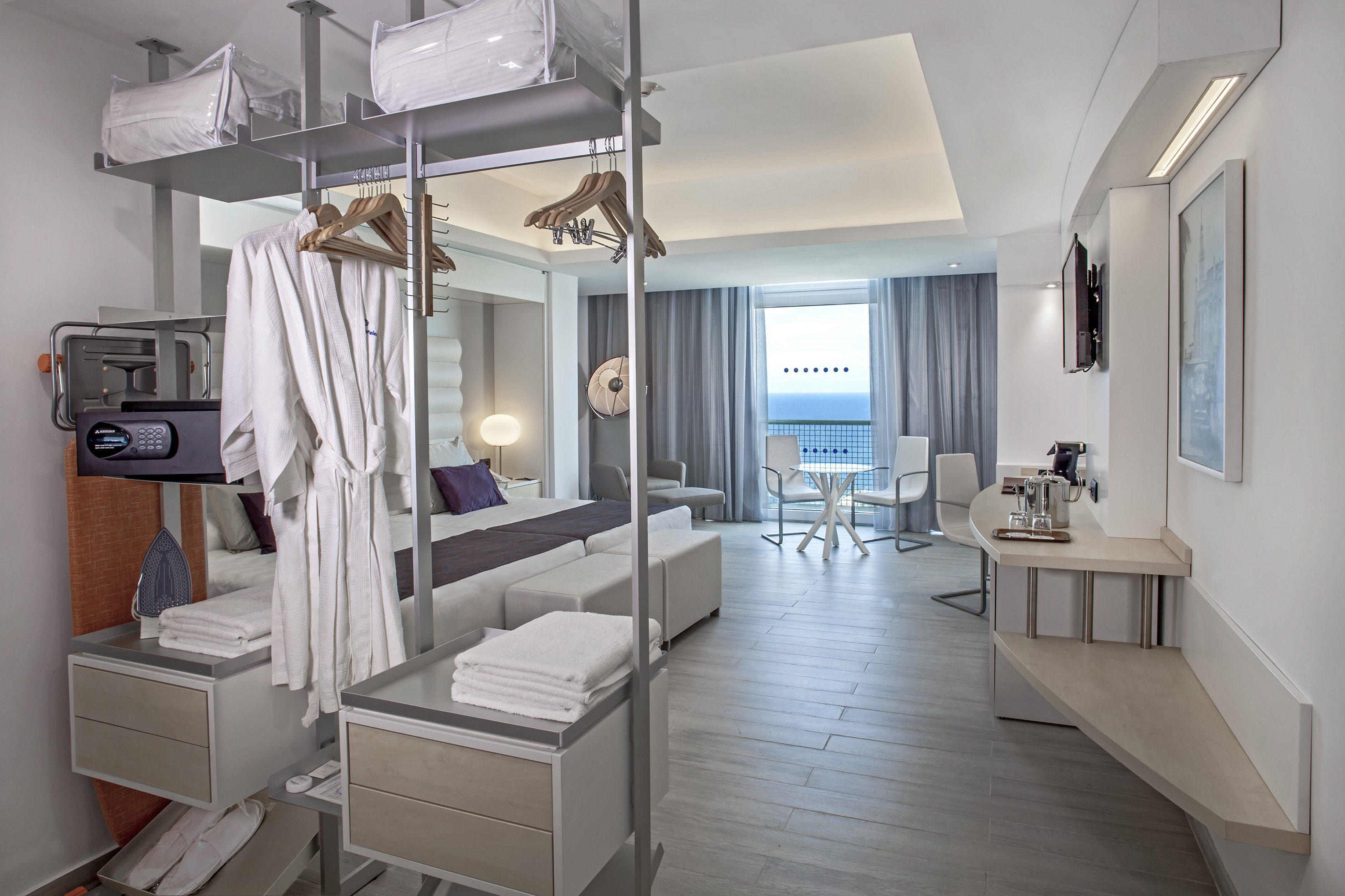 a room with a bed and a table