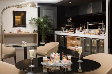 a table with glasses of champagne in it