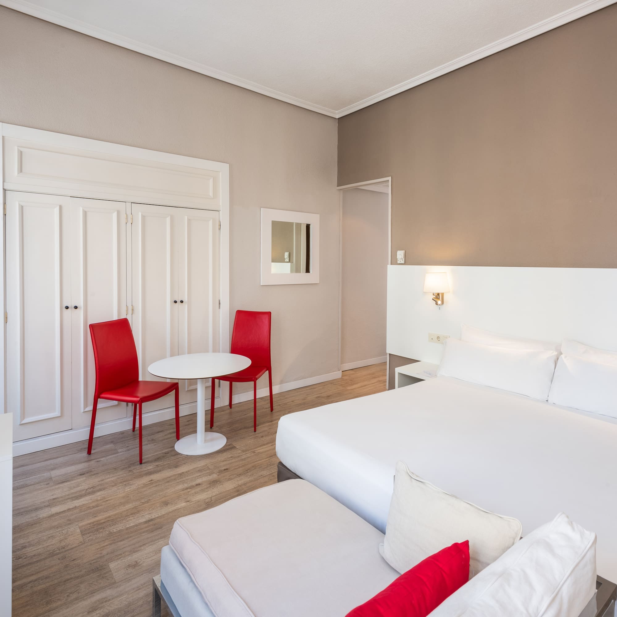 a room with a bed and a table