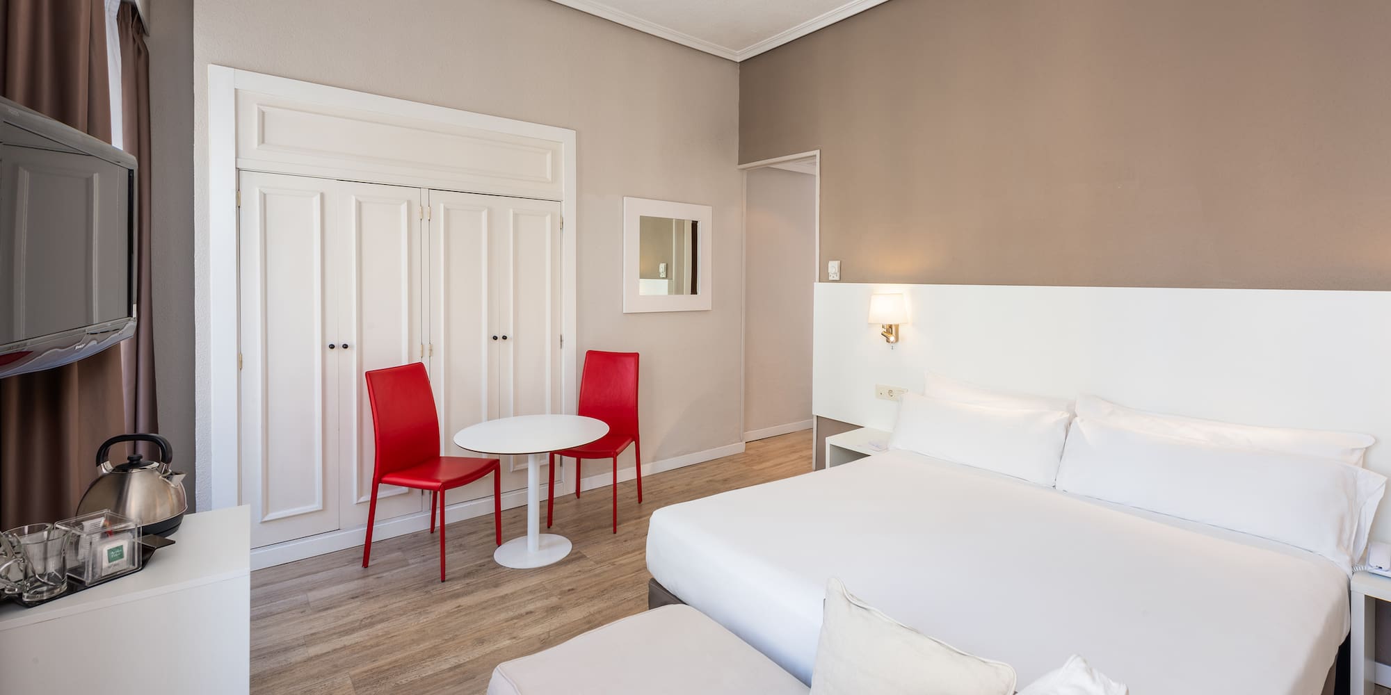 a room with a bed and a table