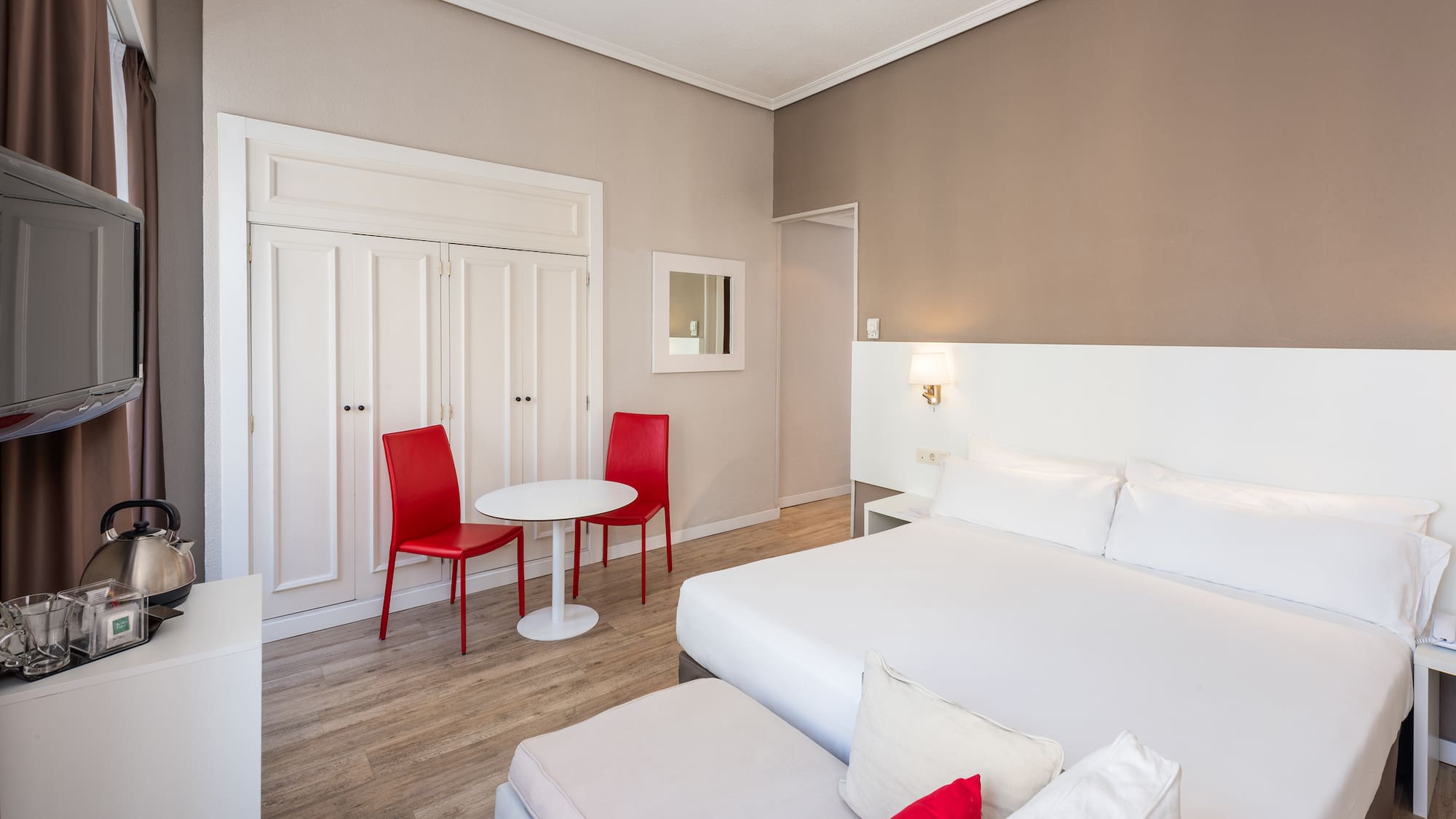 a room with a bed and a table