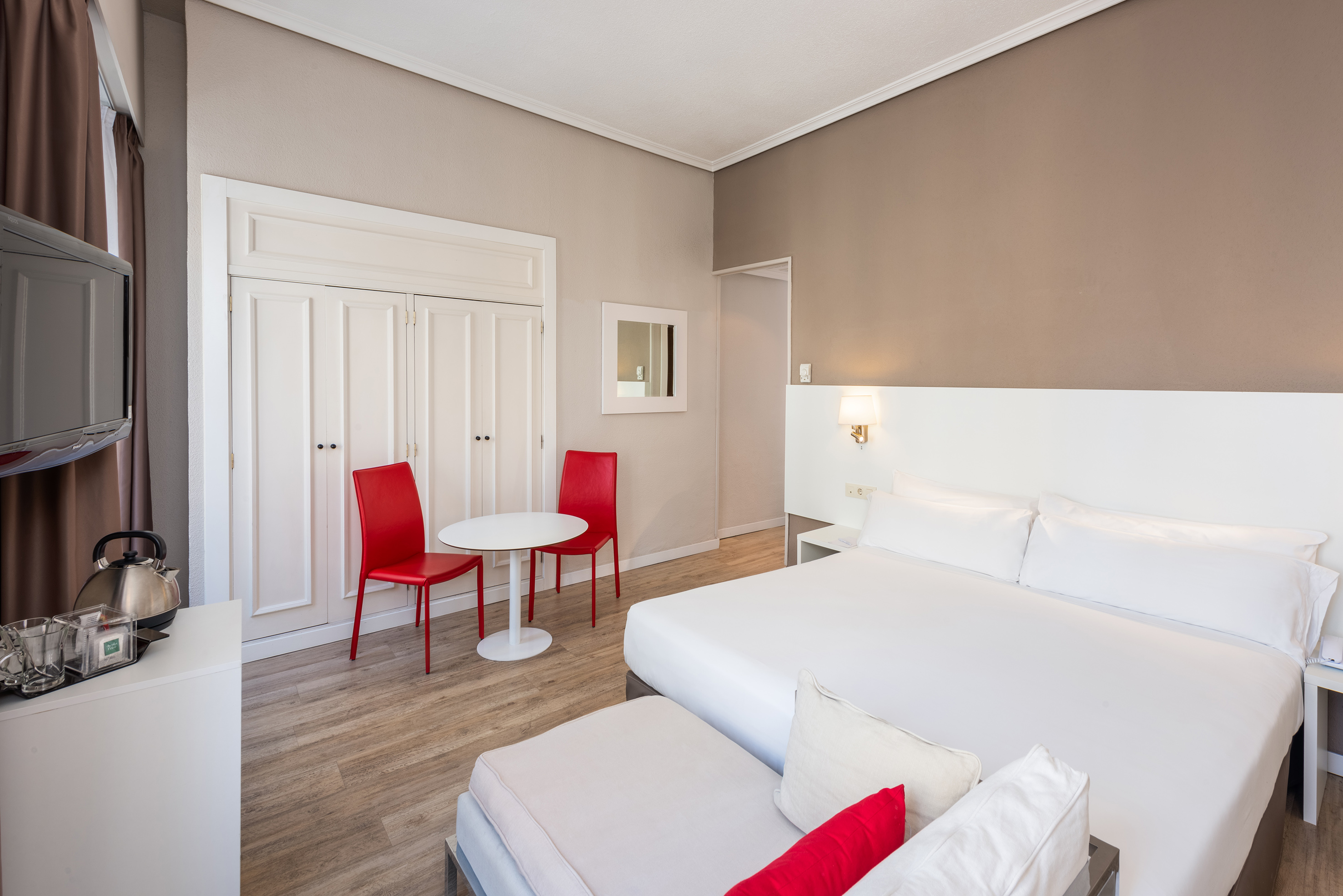a room with a bed and a table