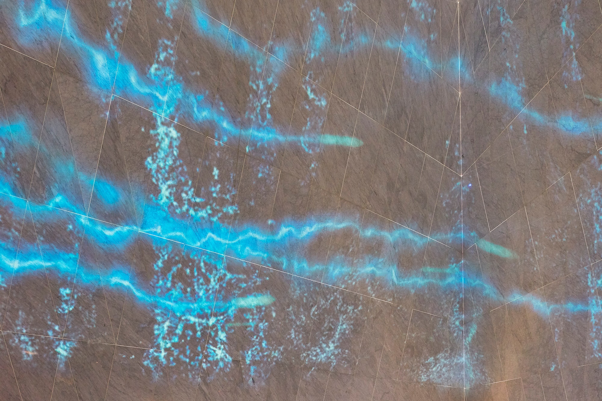 a blue light on a wall