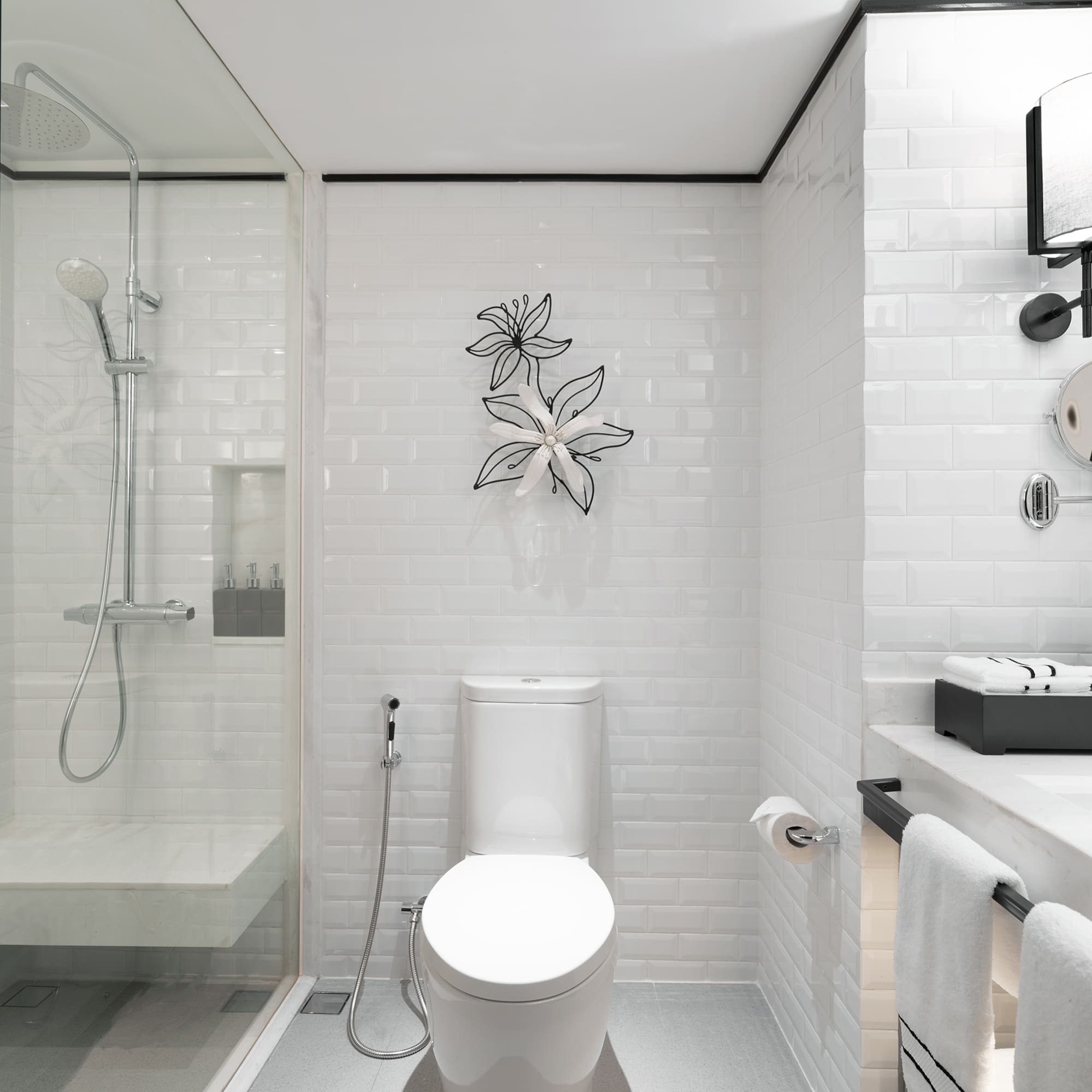 a bathroom with a toilet and shower