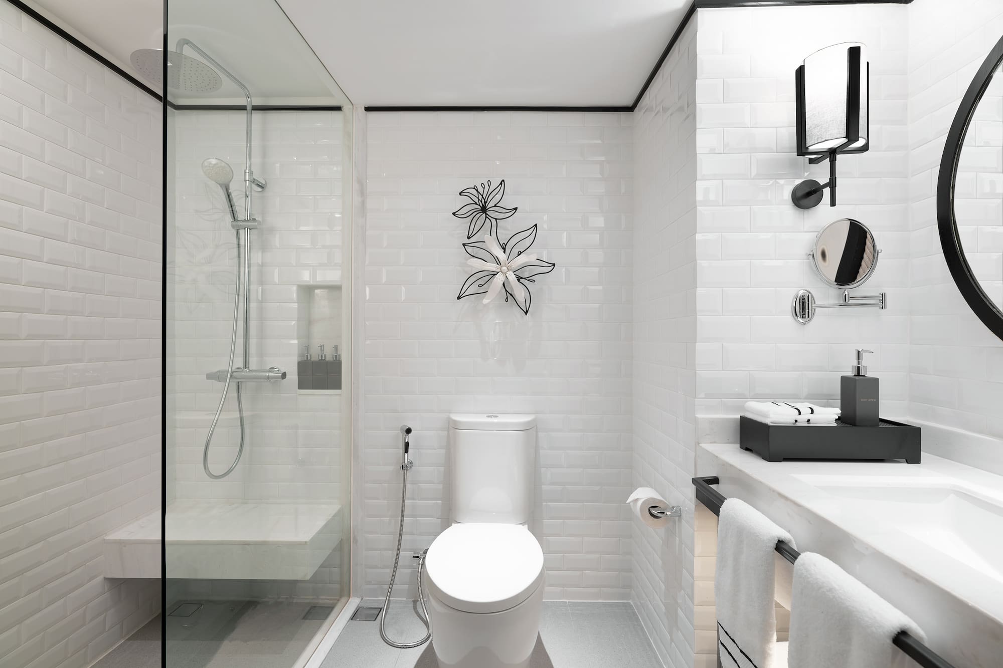 a bathroom with a toilet and shower