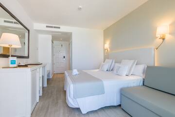 a room with a bed and a table