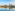 Panoramic Dresden skyline with historic buildings reflected in the Elbe River.
