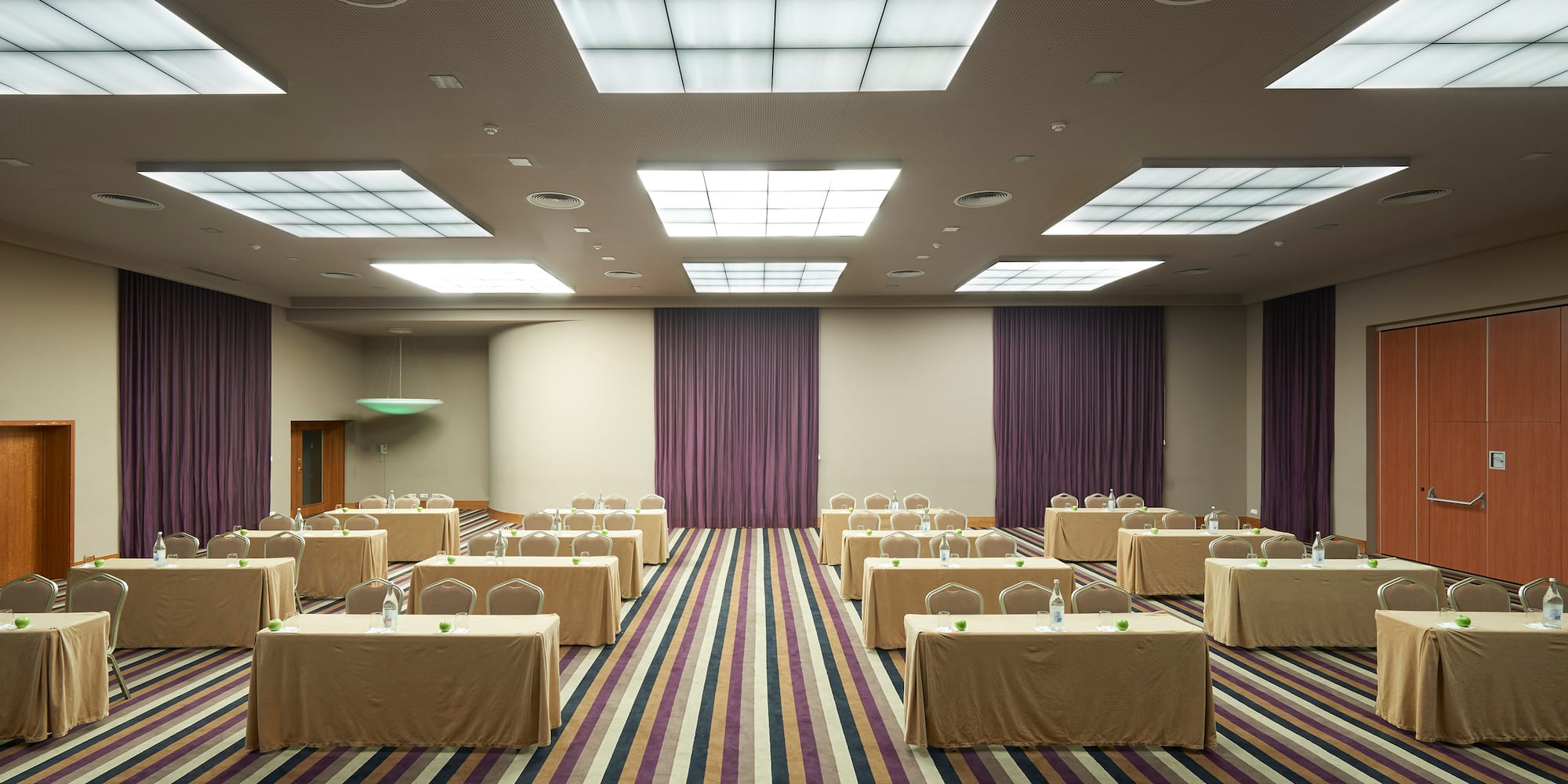 a room with tables and chairs