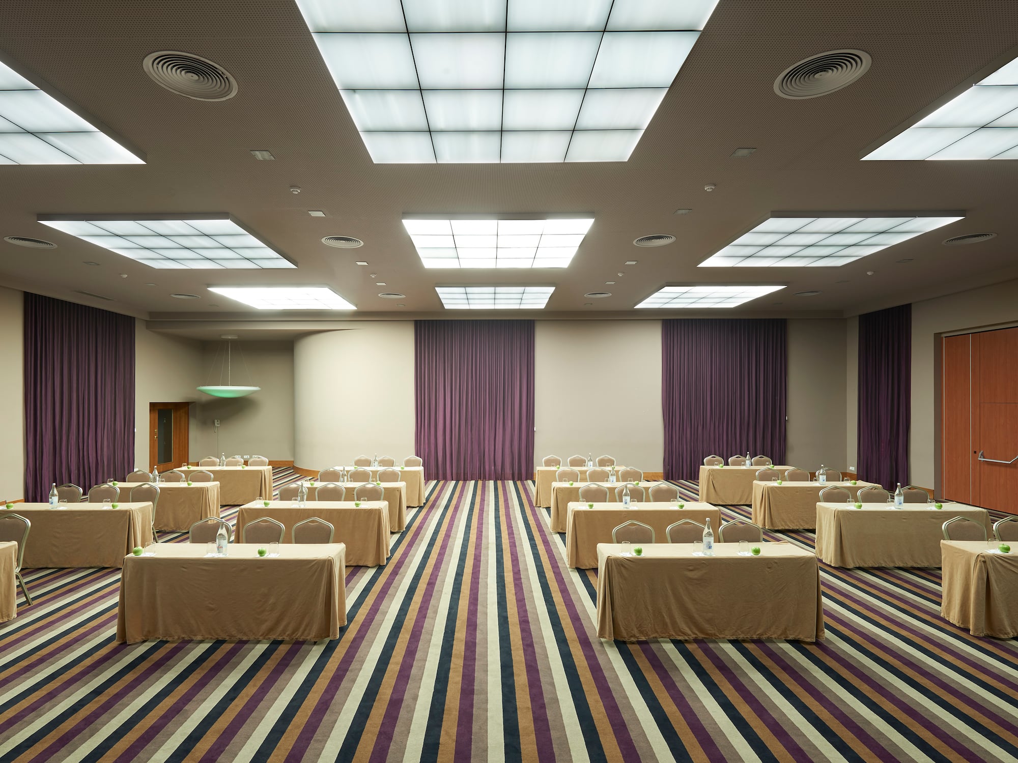 a room with tables and chairs