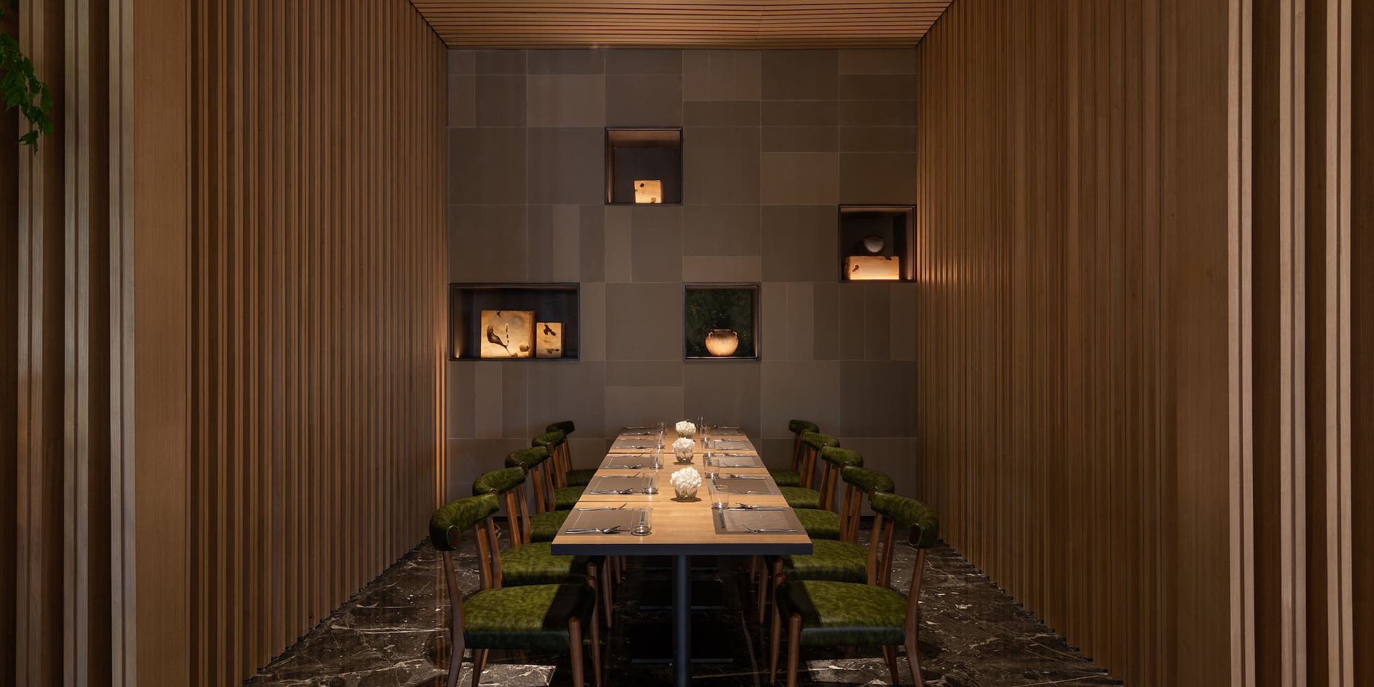 a room with a table and chairs