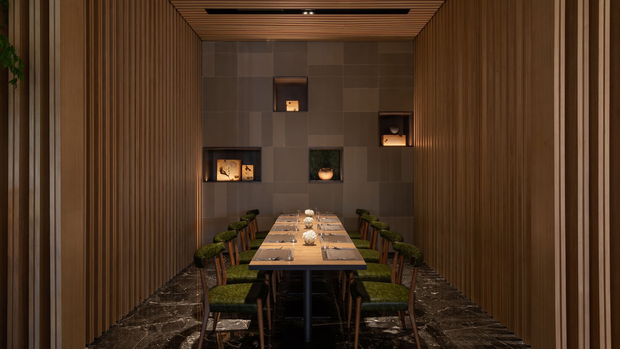 a room with a table and chairs