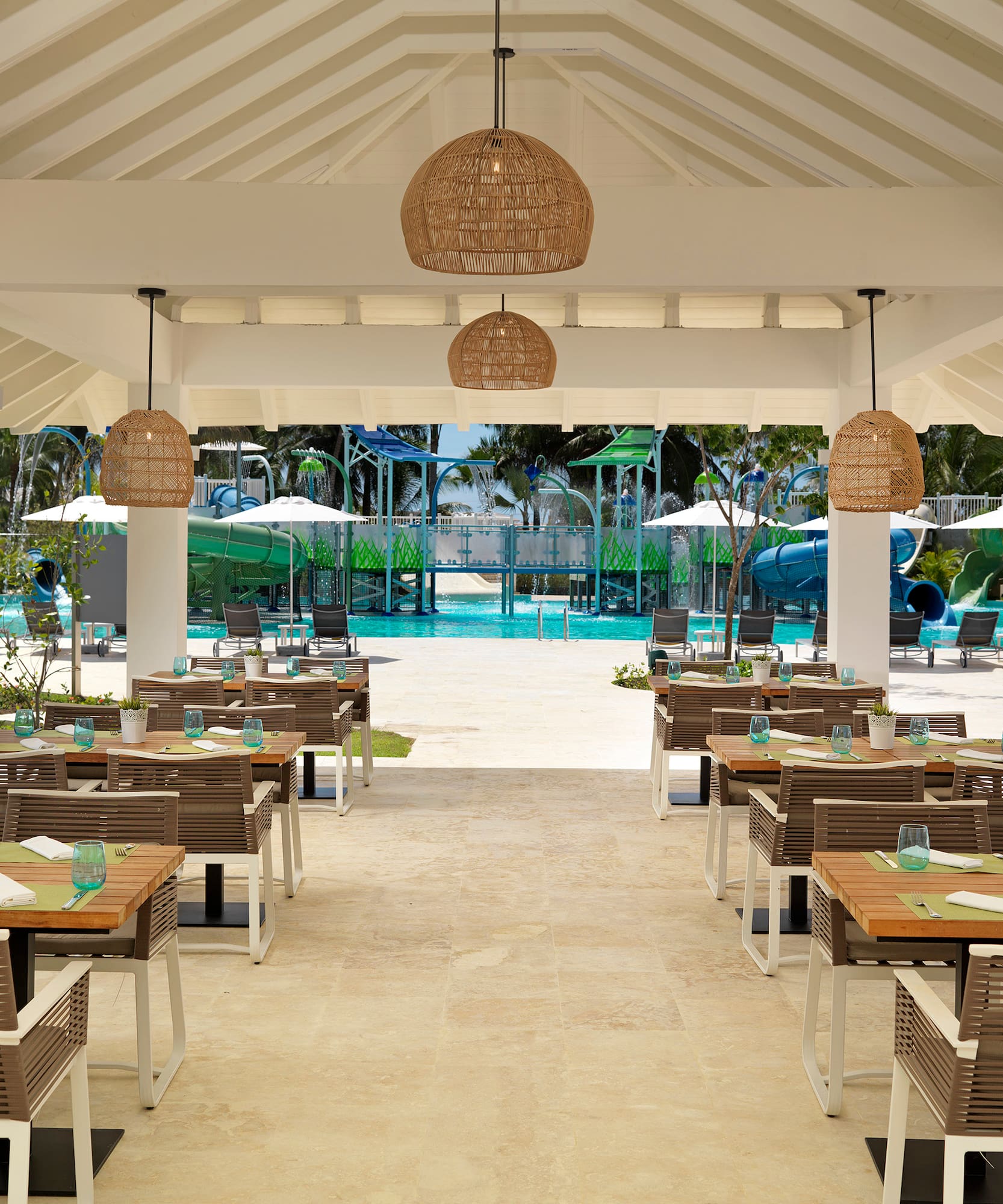 a restaurant with tables and chairs