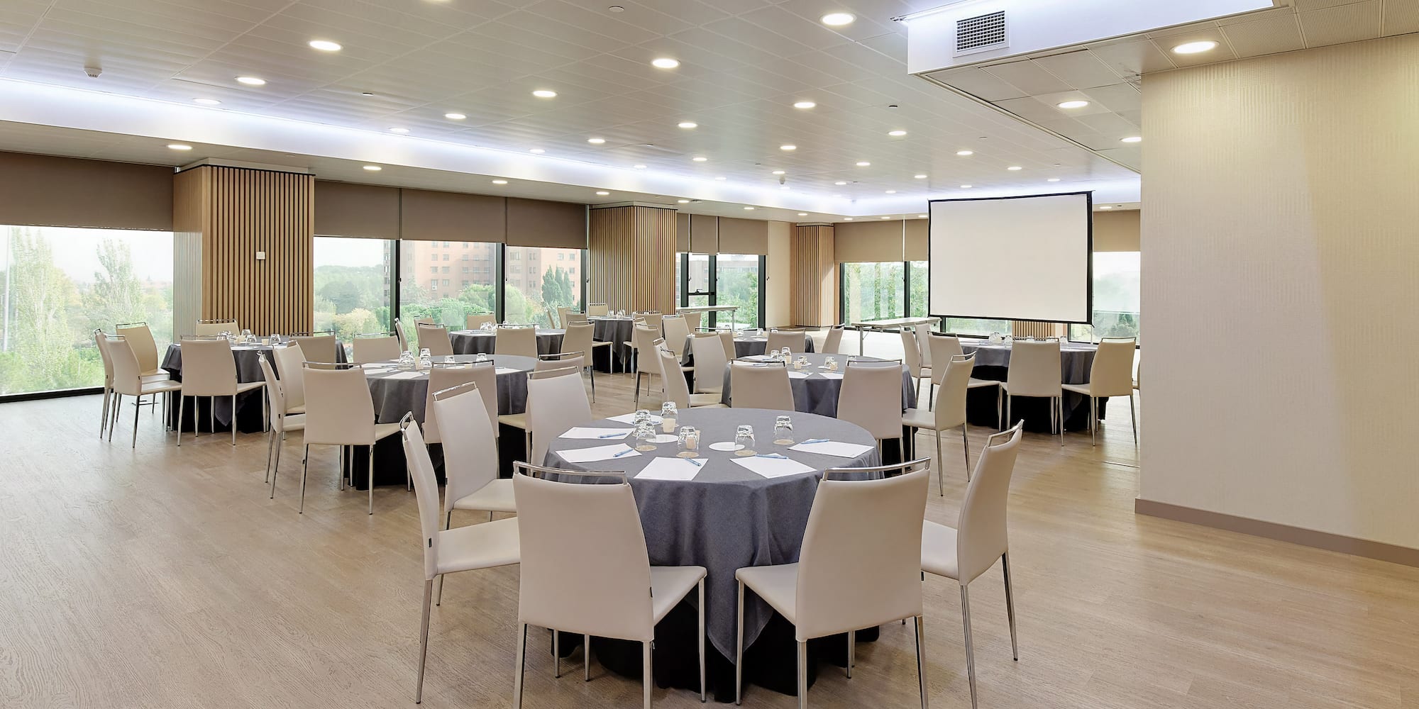 a room with tables and chairs