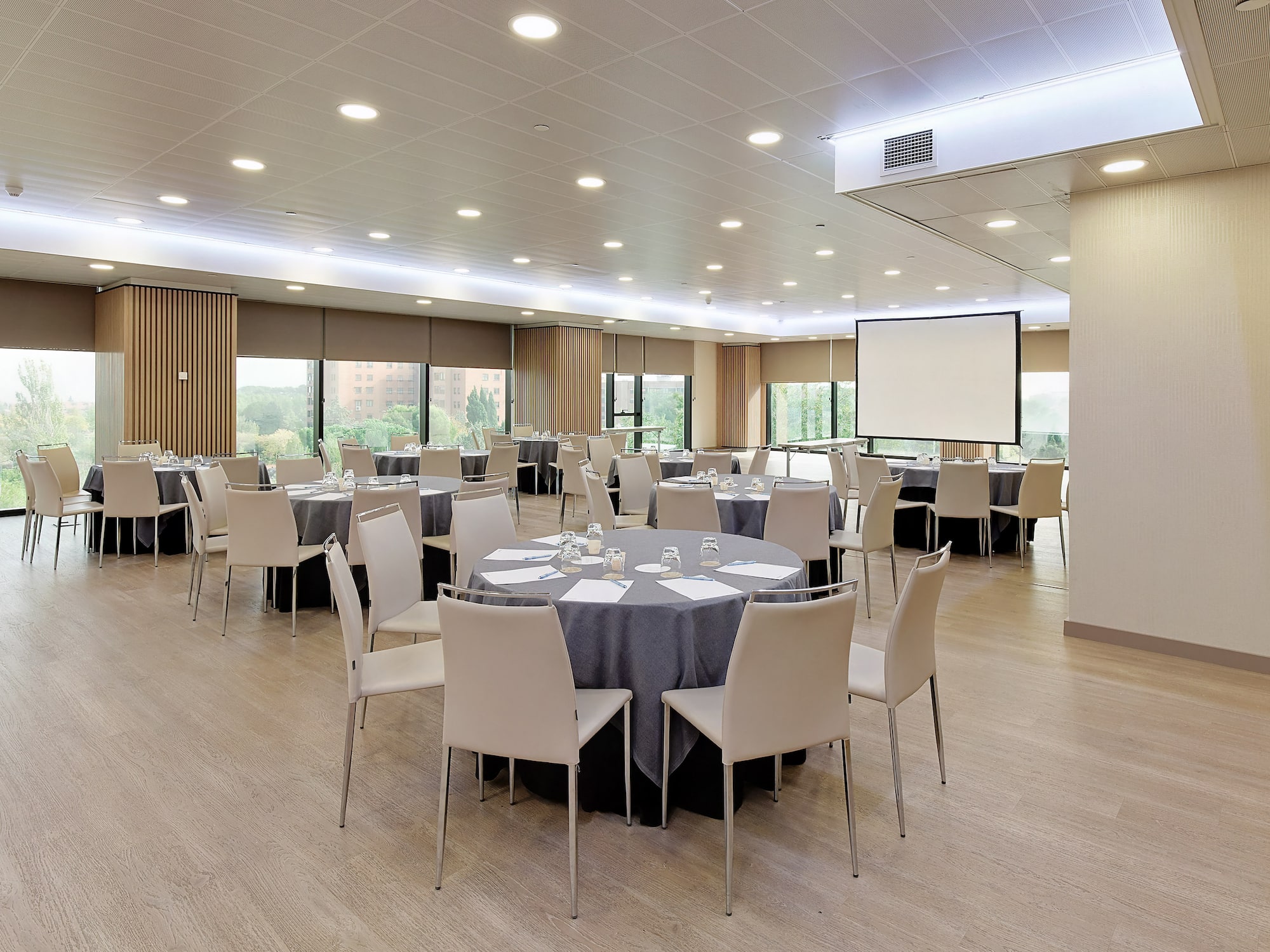 a room with tables and chairs