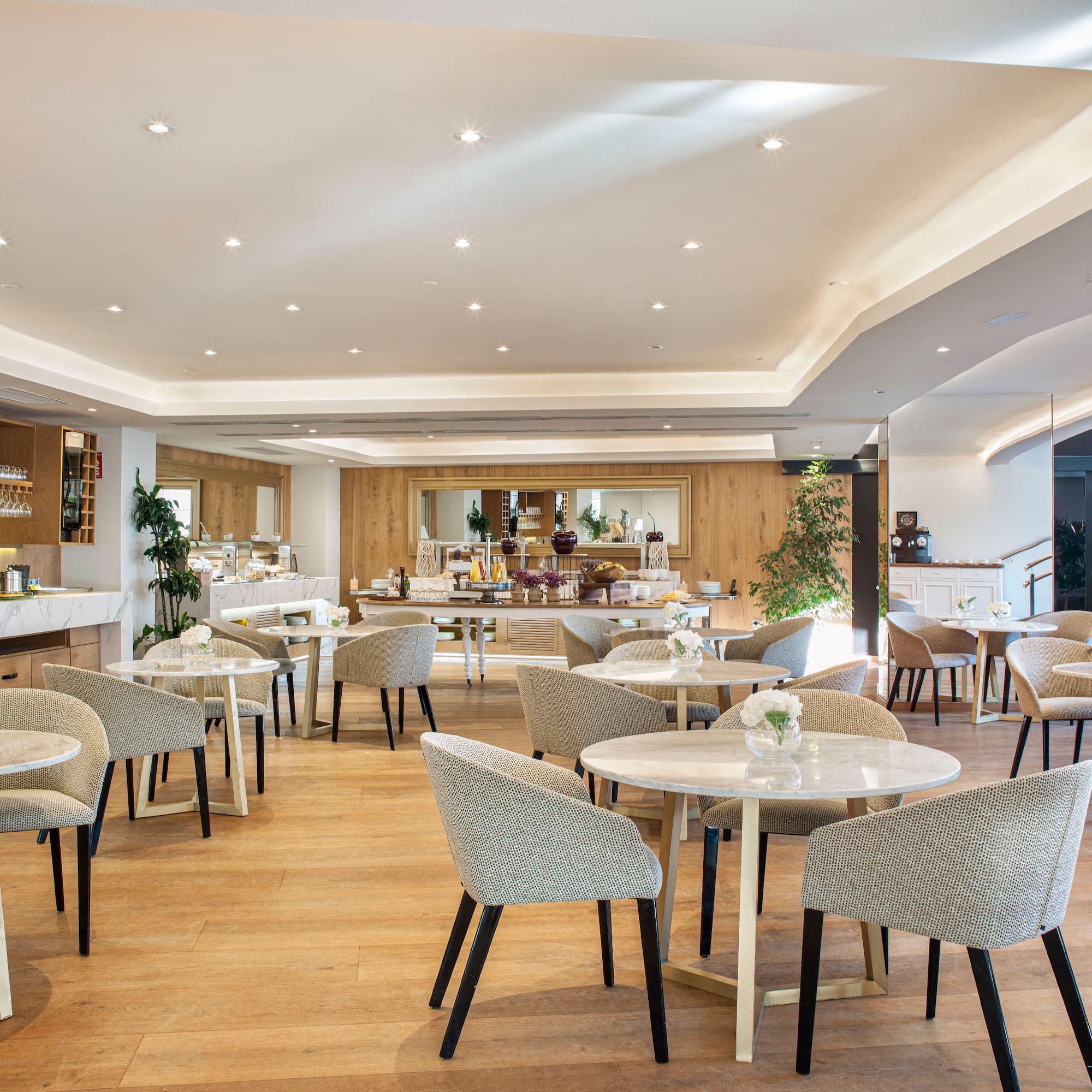 a room with tables and chairs