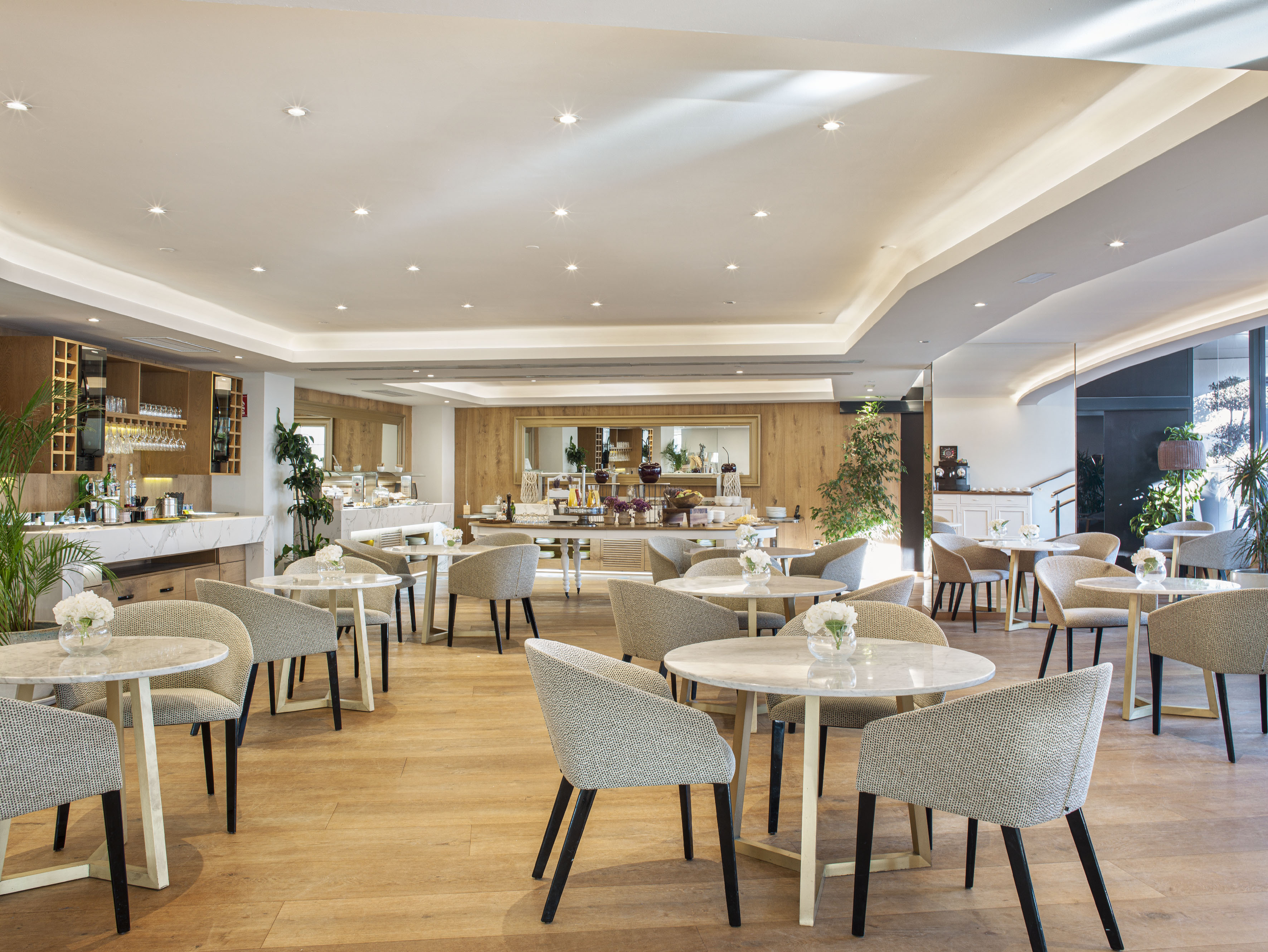 a room with tables and chairs