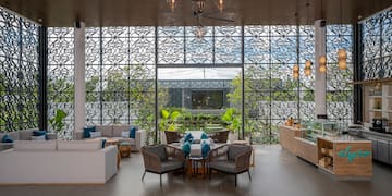 a room with a large window and a large glass wall