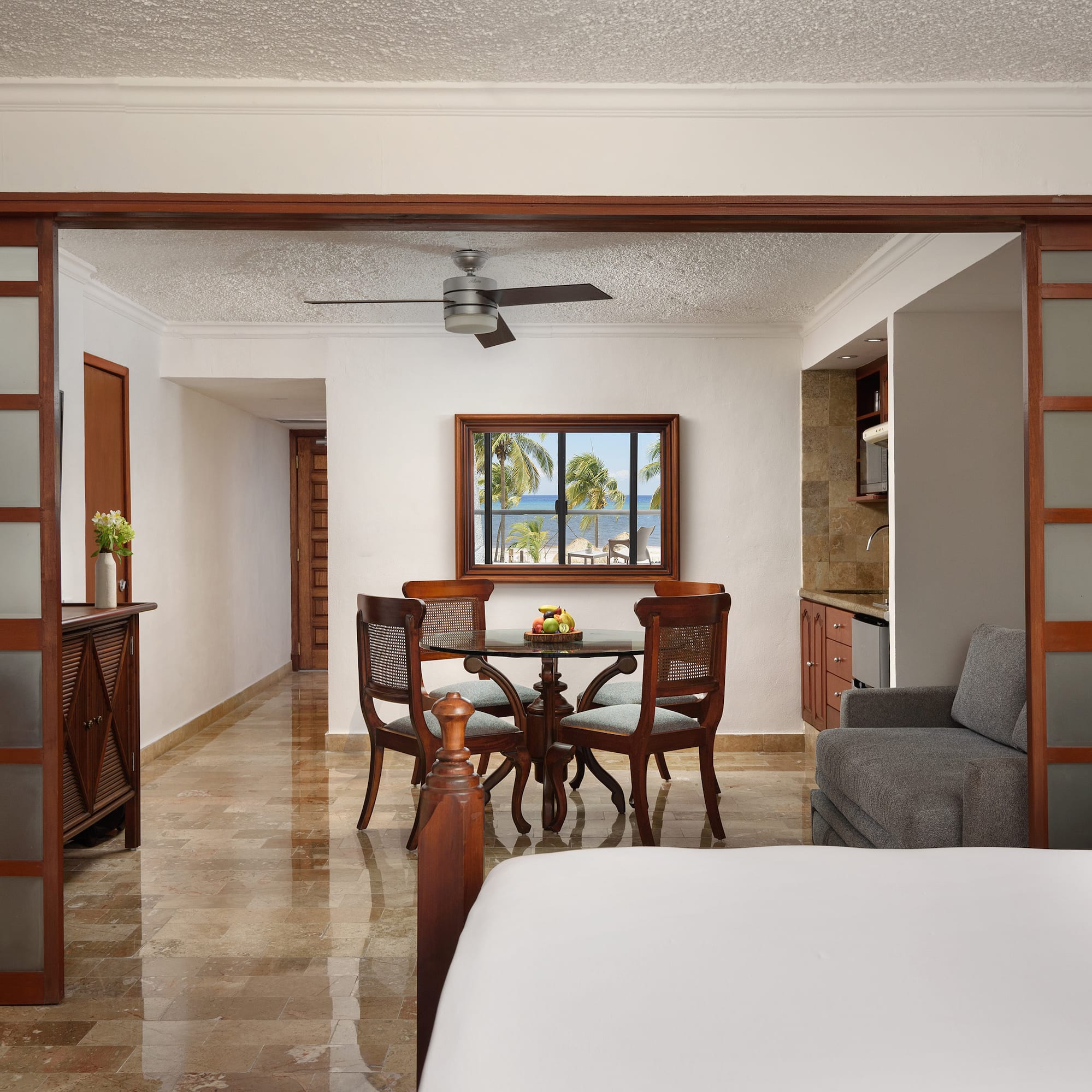 a room with a table and chairs