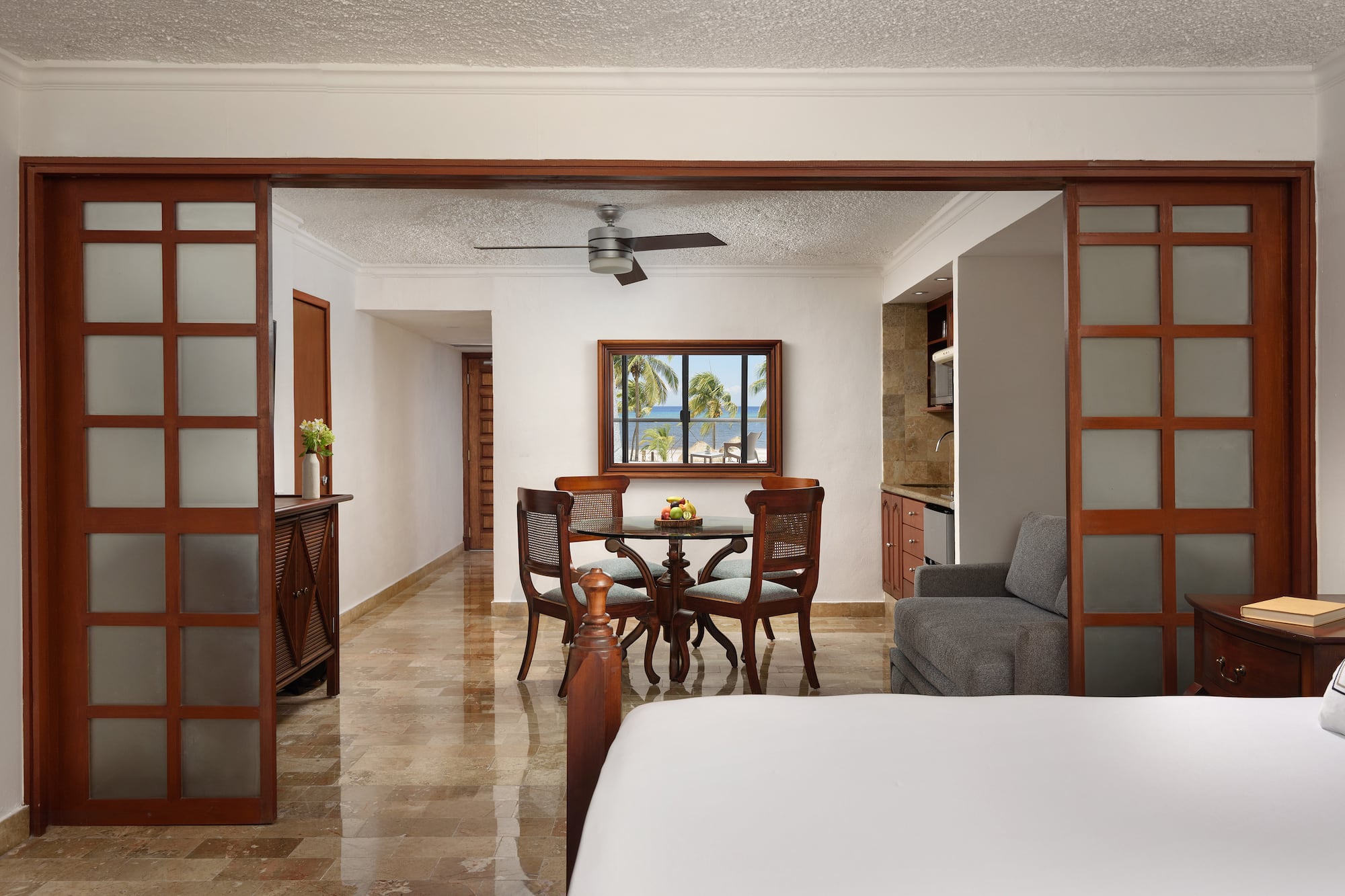 a room with a table and chairs