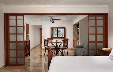 a room with a table and chairs