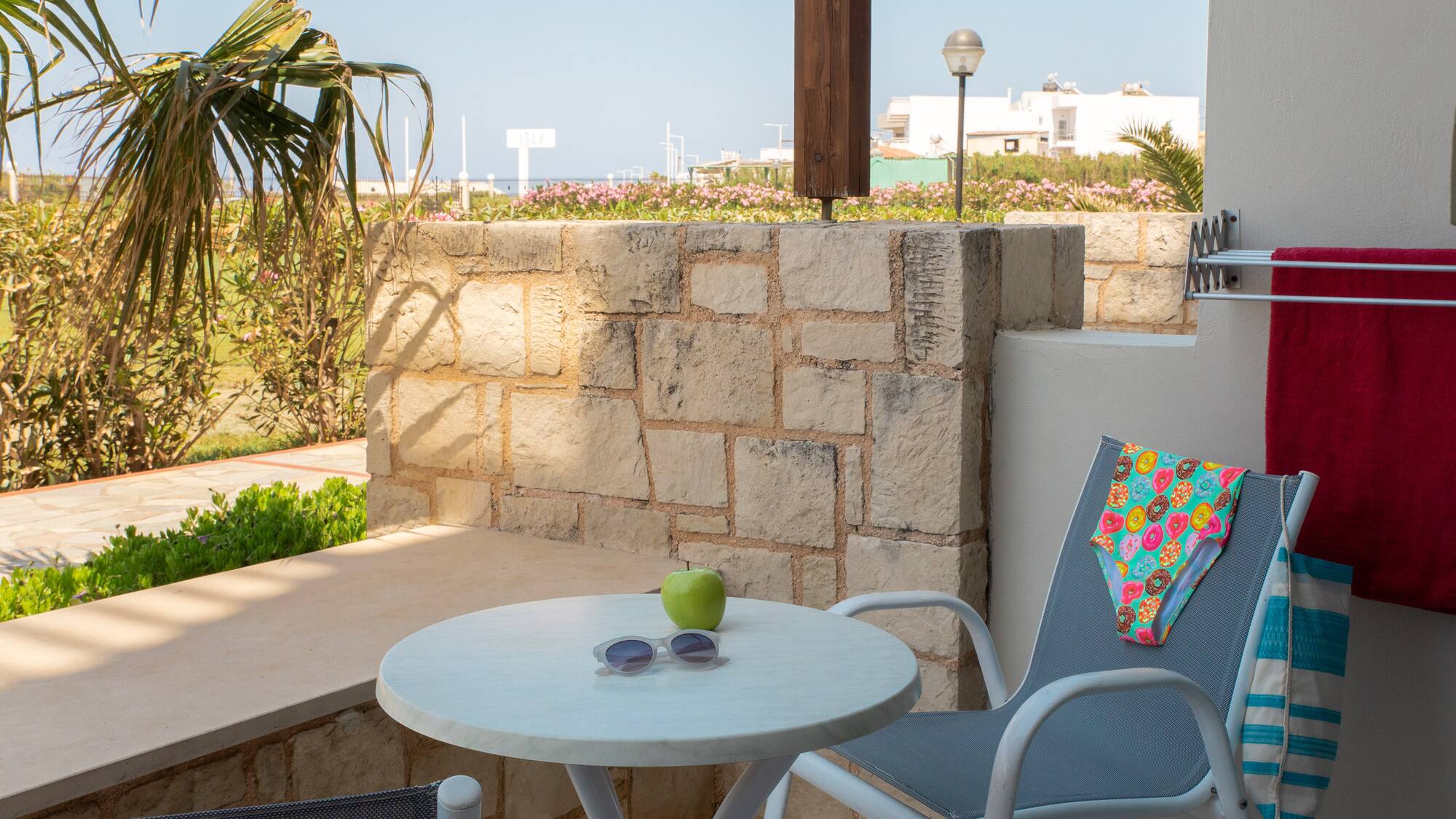 a chair and table on a patio
