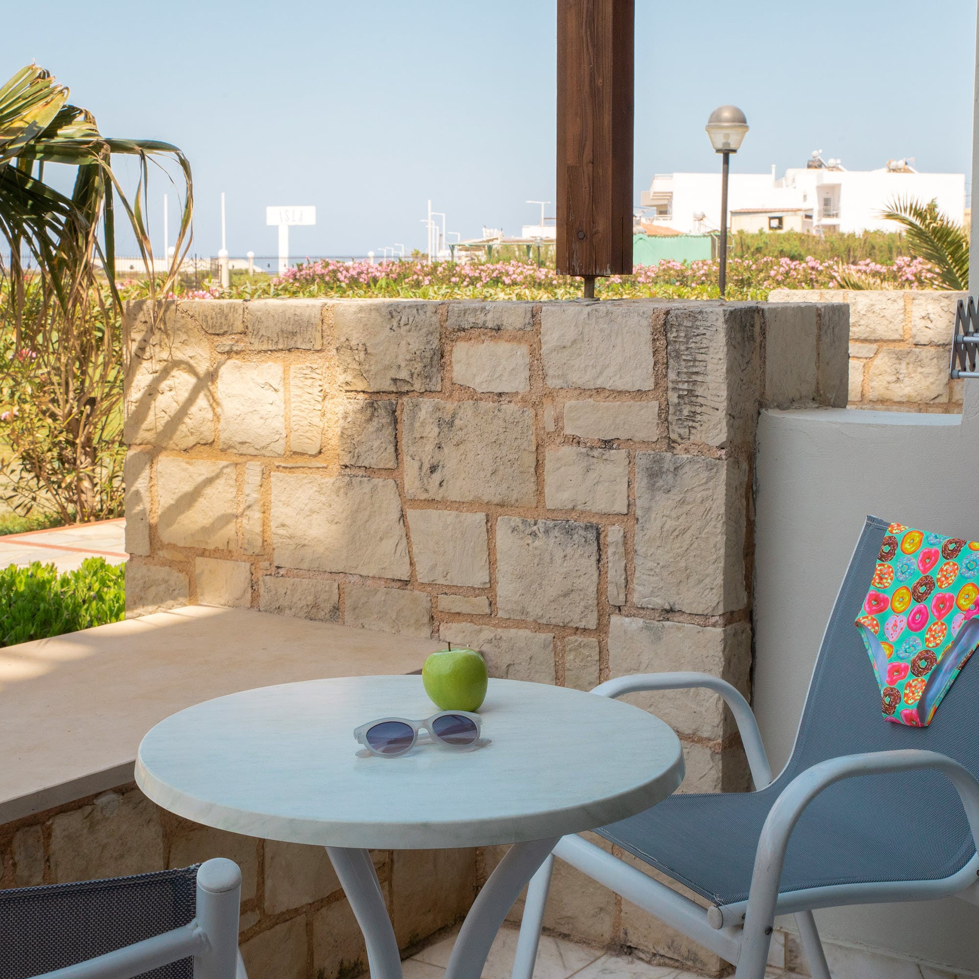 a chair and table on a patio