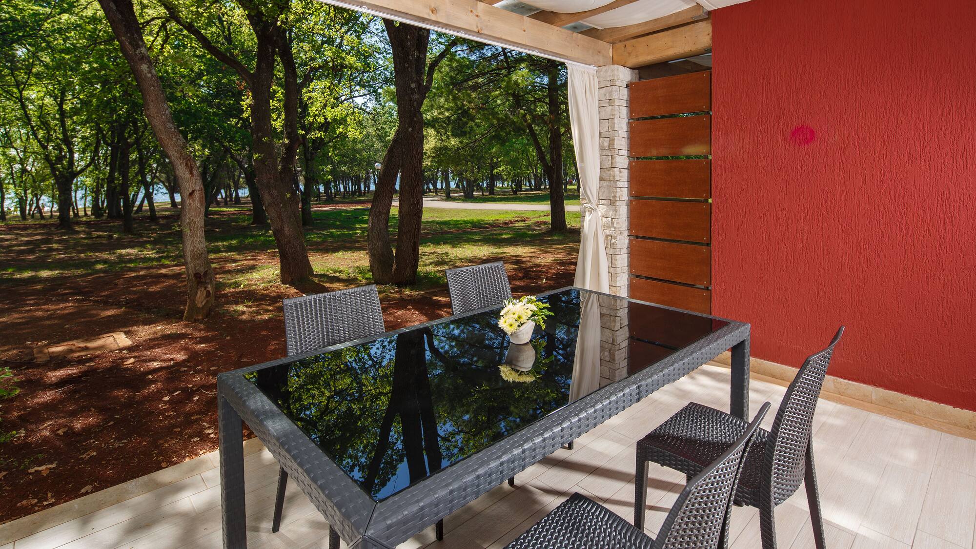a table and chairs on a deck