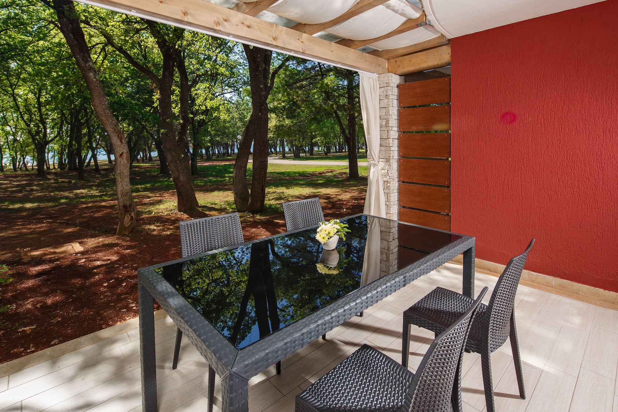 a table and chairs on a deck