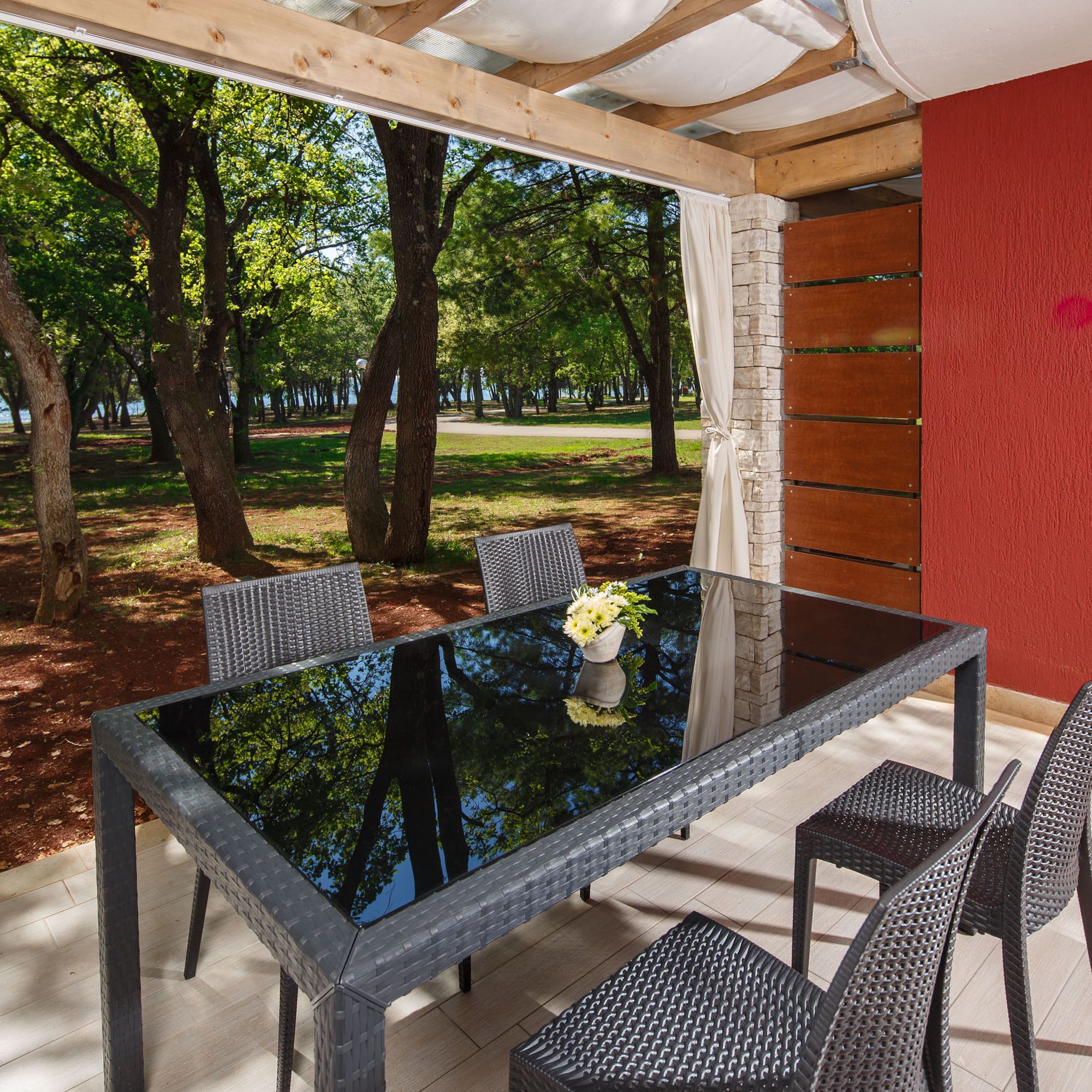 a table and chairs on a deck