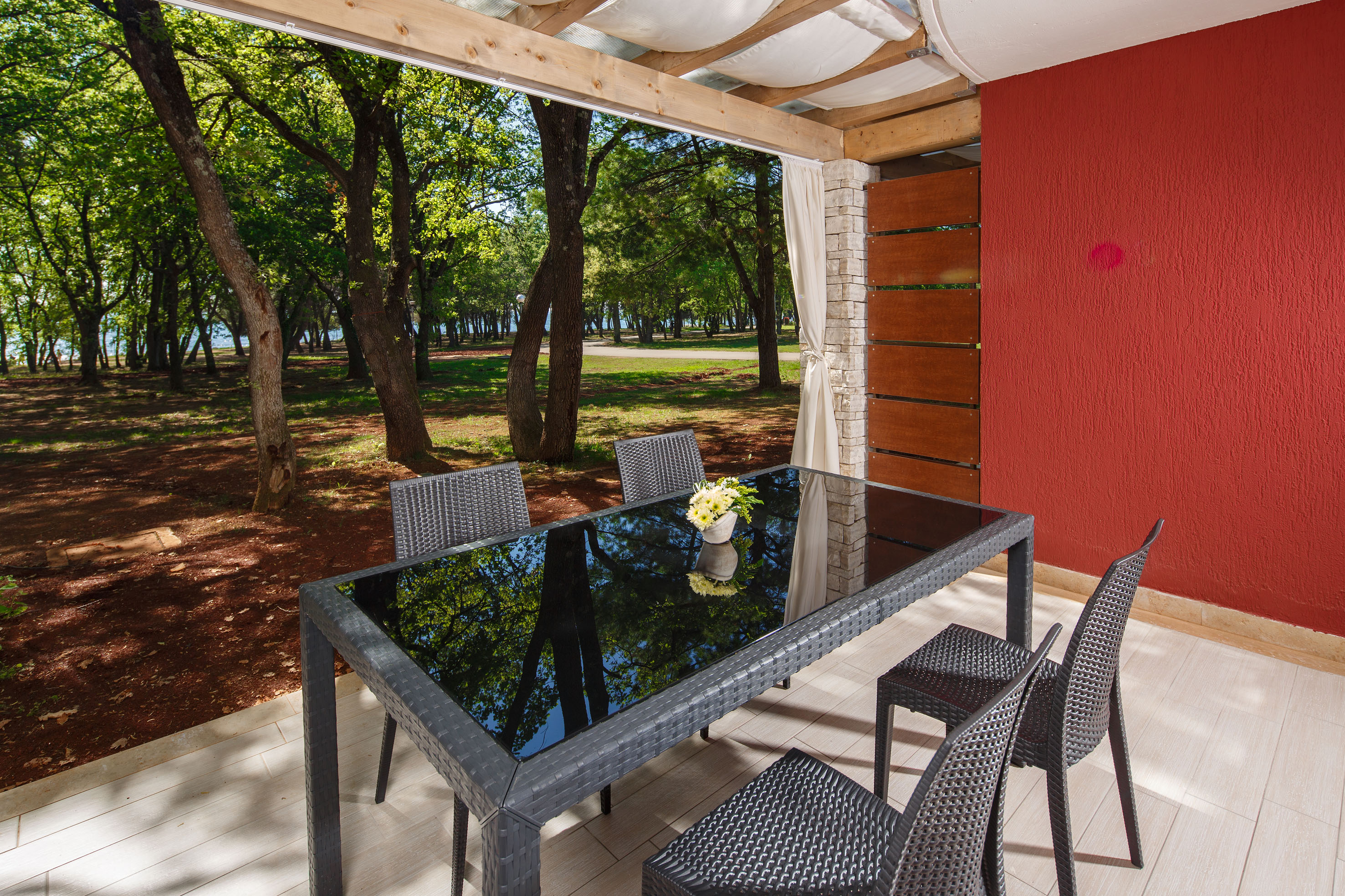 a table and chairs on a deck