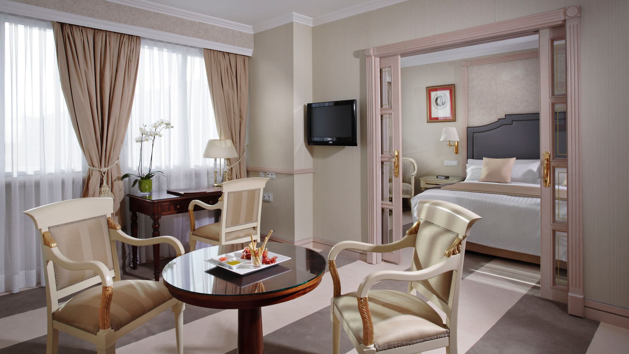 a room with a bed and a table